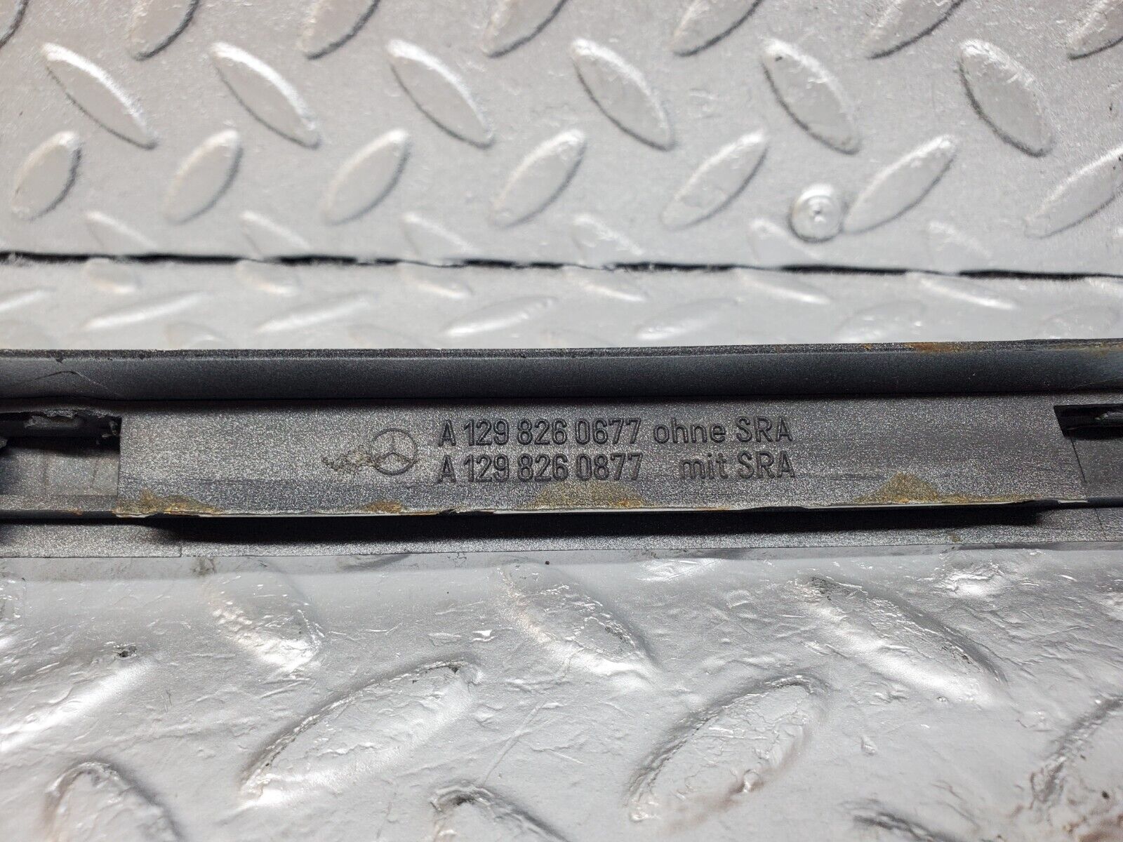 45051 Mercedes-Benz R129 300SL Coupe Right Headlight Lower Trim 1298260677 1298260877