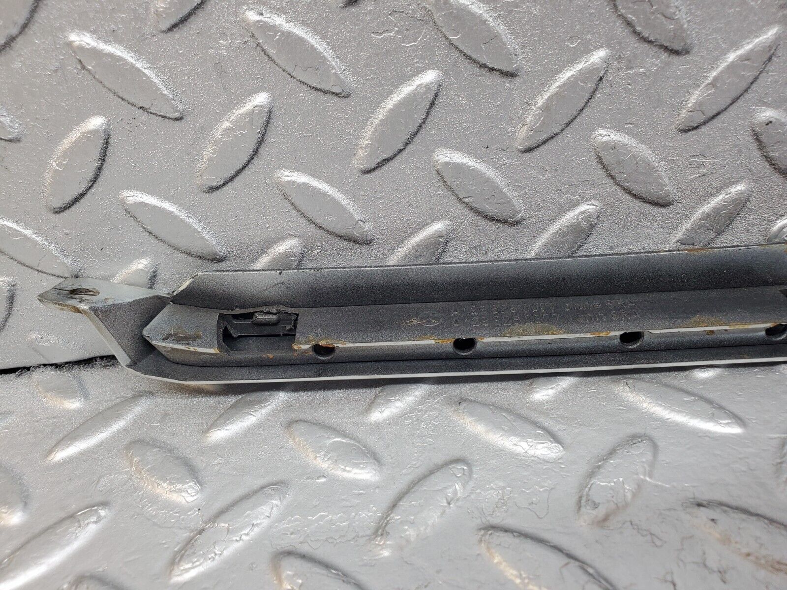 45051 Mercedes-Benz R129 300SL Coupe Right Headlight Lower Trim 1298260677 1298260877