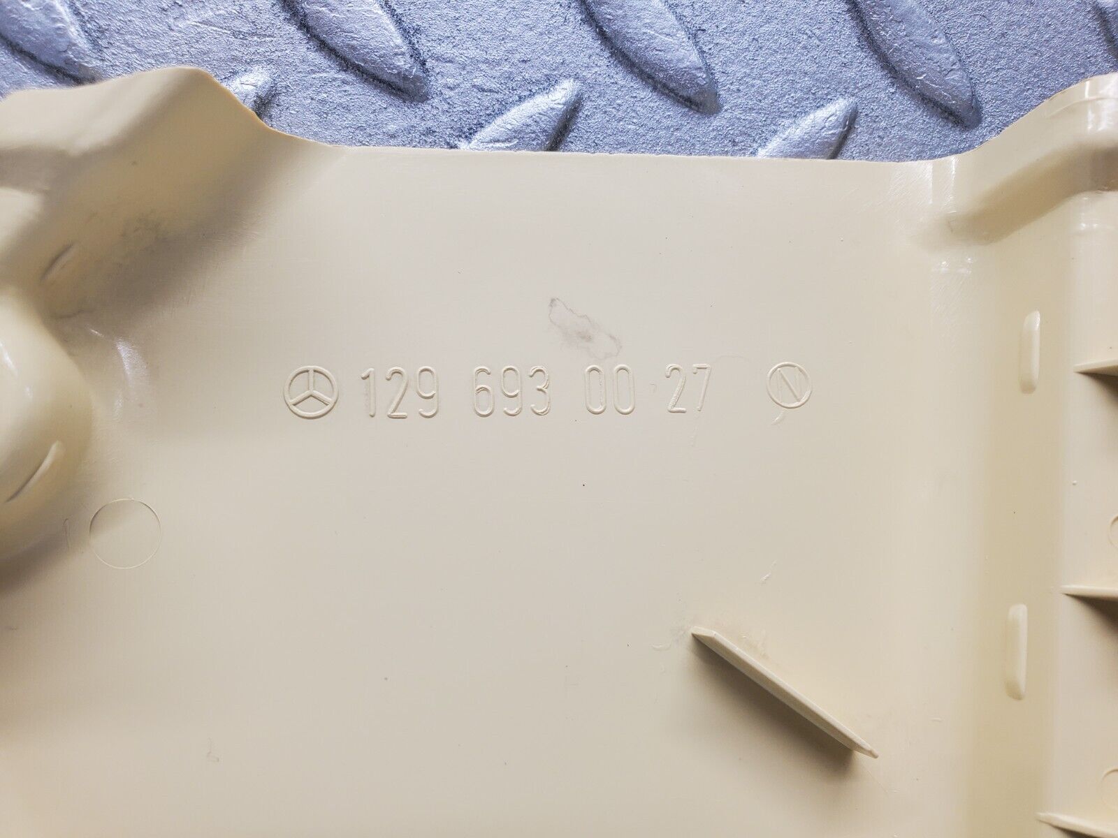 46958 Mercedes-Benz R129 320SL Coupe Trunk Lock Cover Beige 1296930027