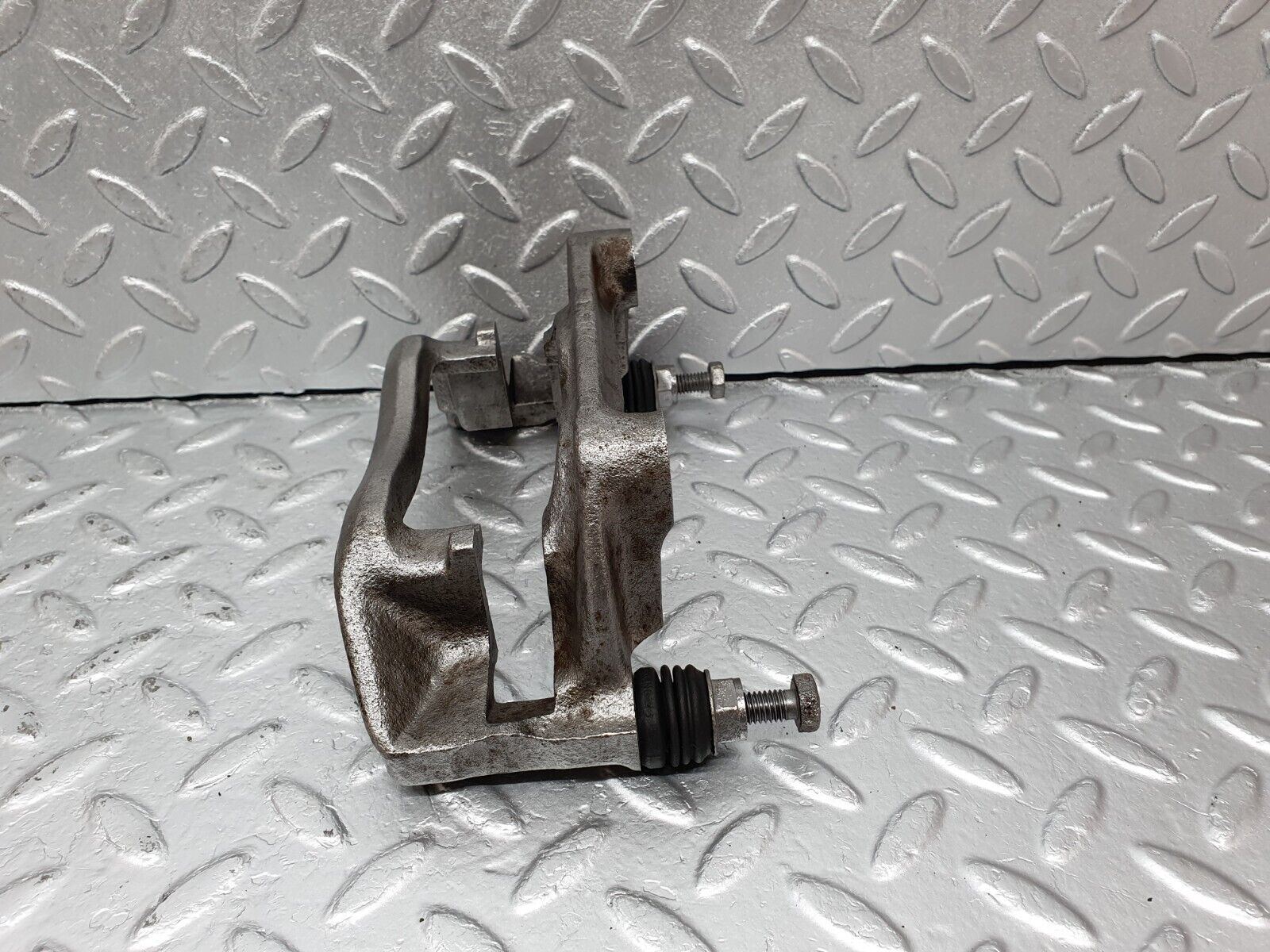 41611 Mercedes-Benz W124 200E Front Right Brake Caliper Bracket