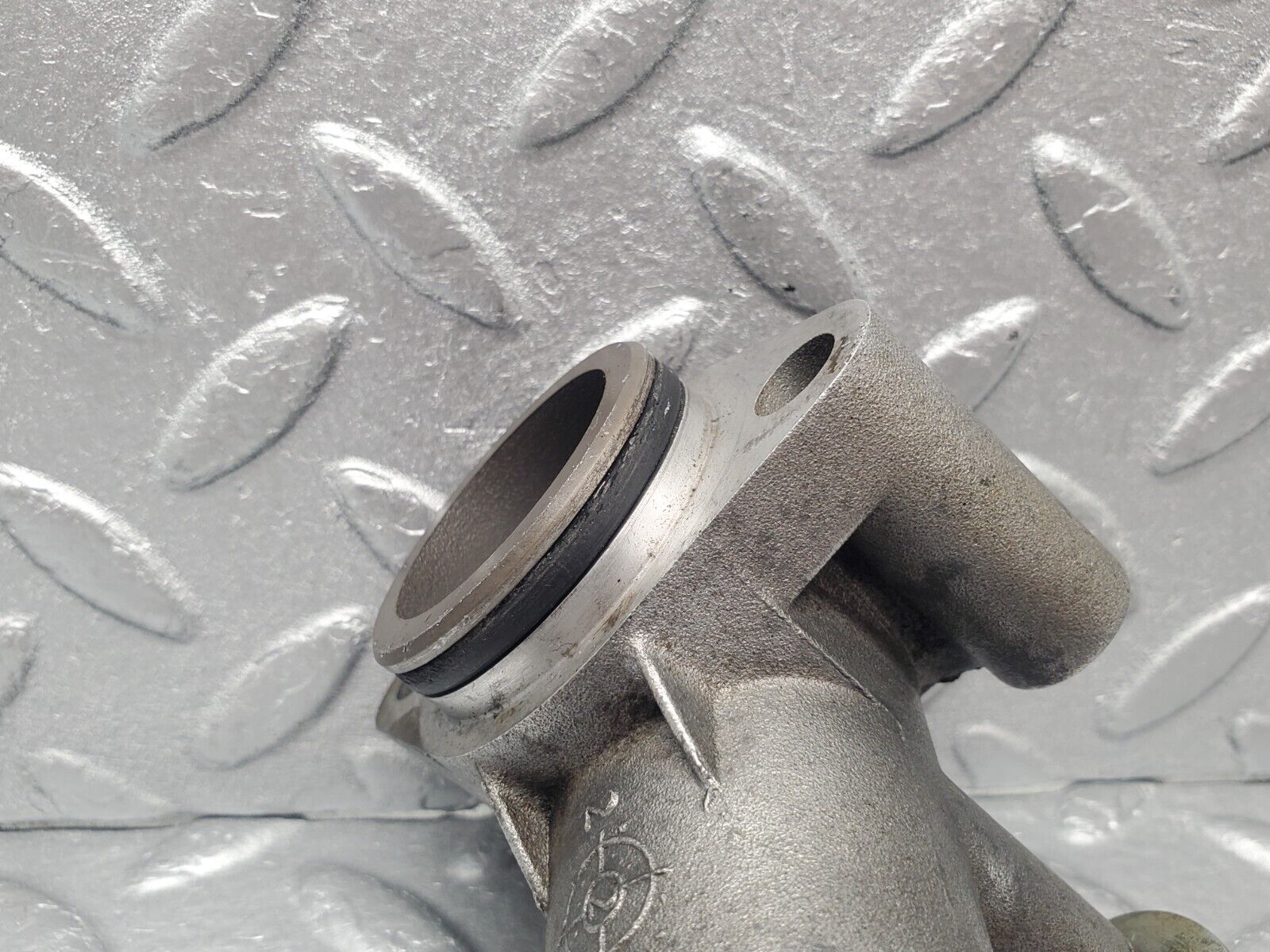 46179 Mercedes-Benz W124 280E Coolant Flange Pipe 1042030431