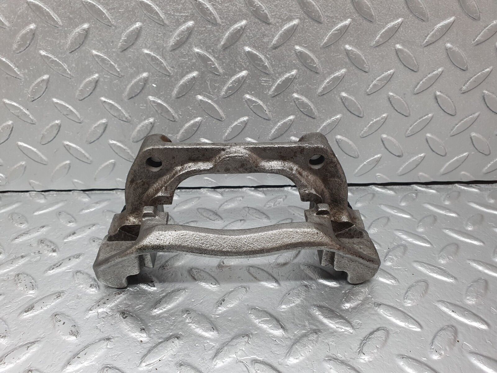 41611 Mercedes-Benz W124 200E Front Right Brake Caliper Bracket