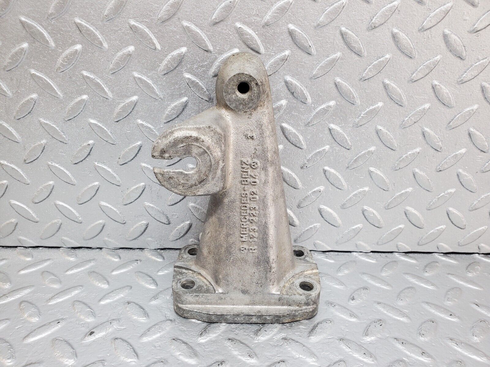 44397 Mercedes-Benz W123 280E Engine Mount Bracket Left Side 1232230204