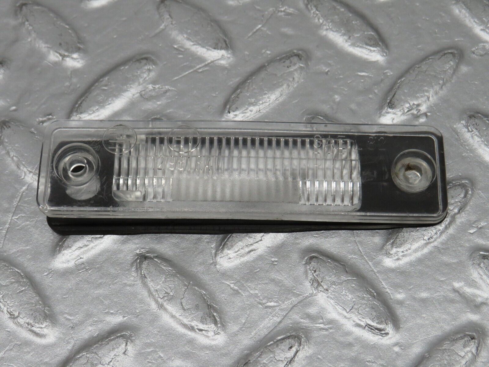 39136 Mercedes-Benz R107 500SL number Plate Light Lens 12981R4