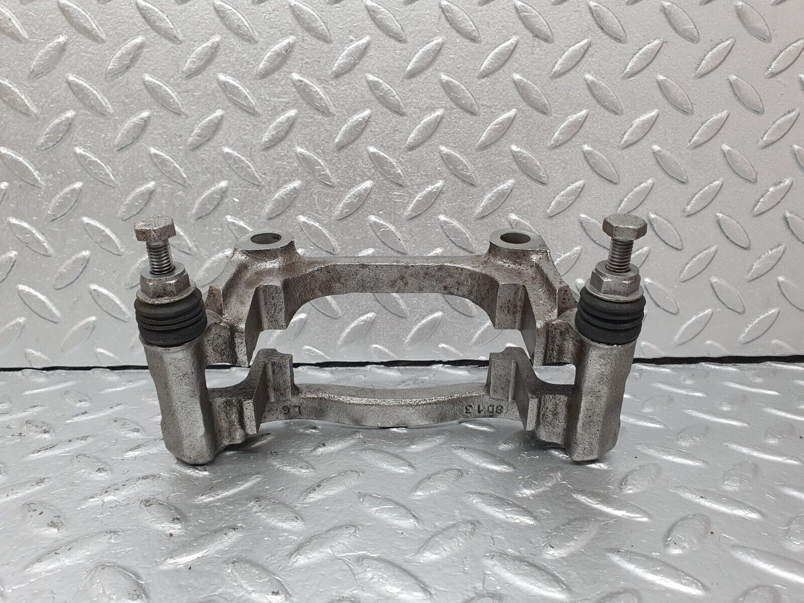 41611 Mercedes-Benz W124 200E Front Right Brake Caliper Bracket