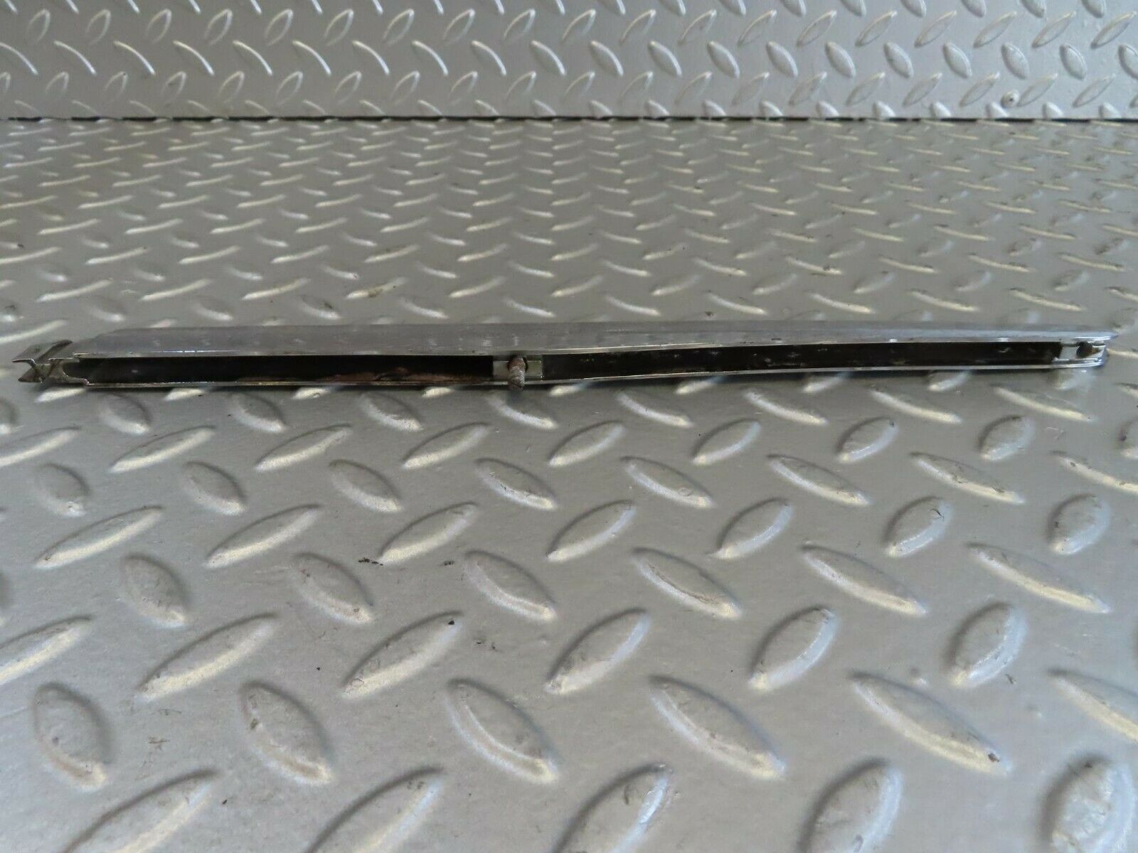 15720 Mercedes-Benz R107 450SL Trunk Chrome Handle Moulding Left 1076901380