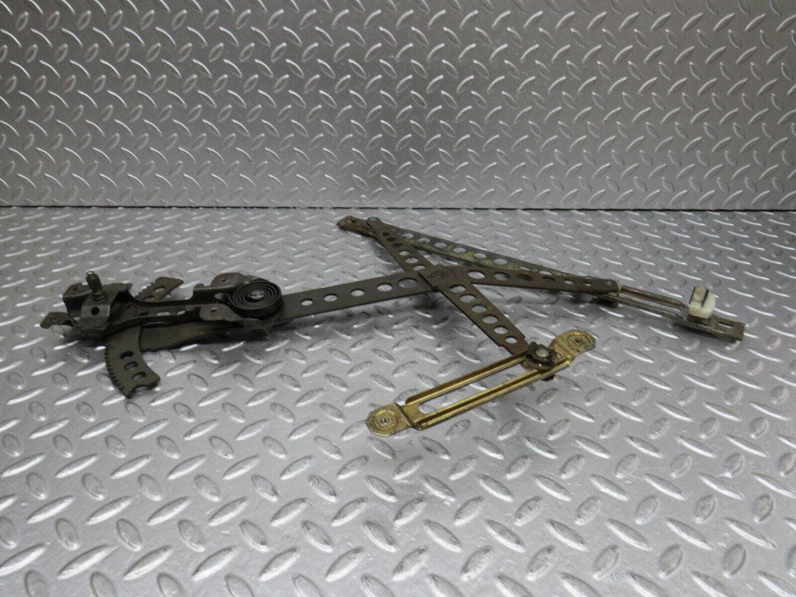 31140 Mercedes-Benz W123 200D Front Left Manual Window Regulator 1237200346