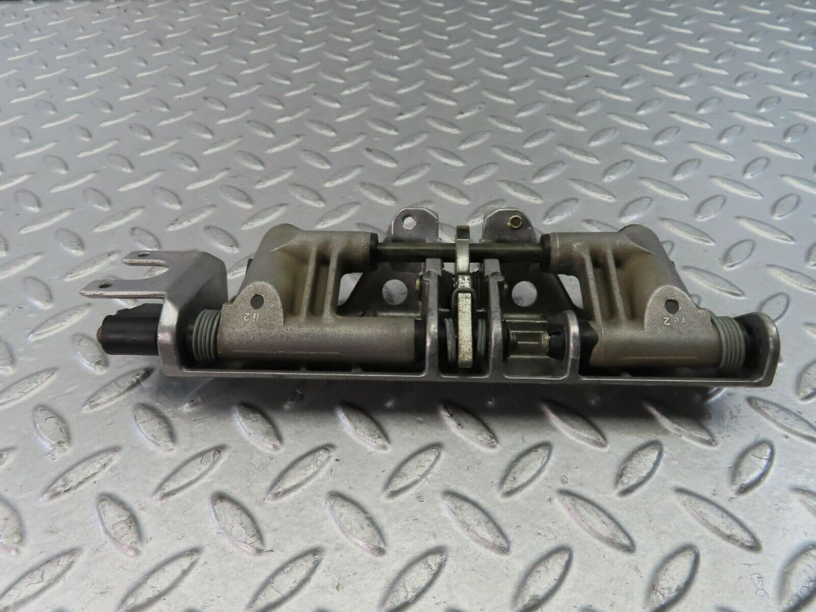 9319 Mercedes-Benz C124 300CE Coupe Headrest Folding Mechanism 1249700025