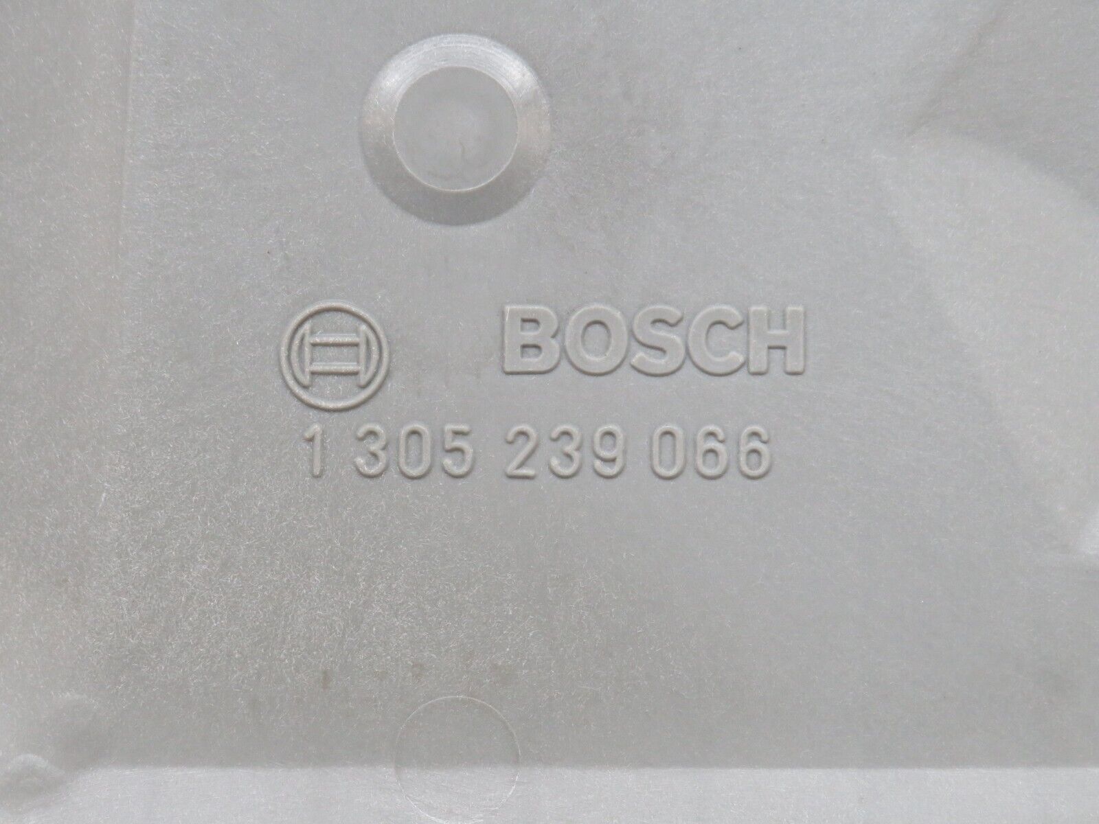 33163 Mercedes-Benz W124 Bosch Headlight Cover Right 1305239066