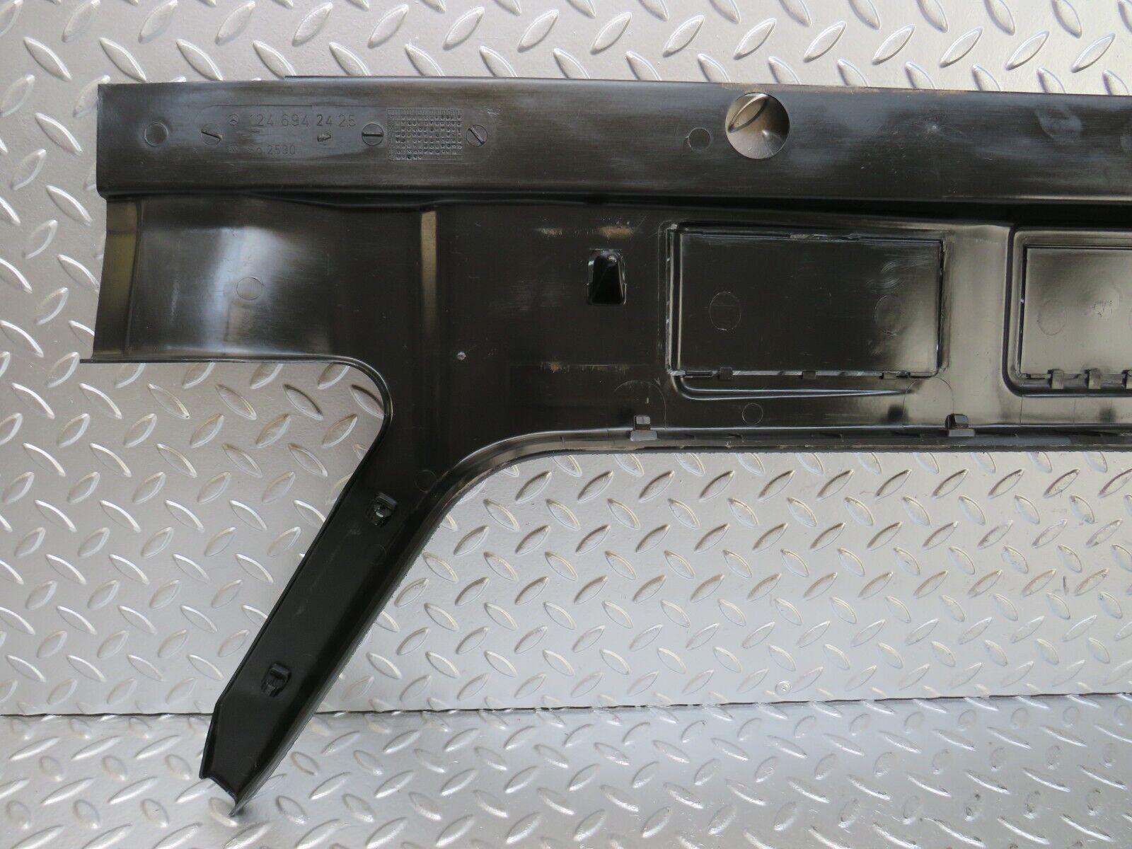 25888 Mercedes-Benz W124 280E Trunk Lock Trim Panel 1246942425