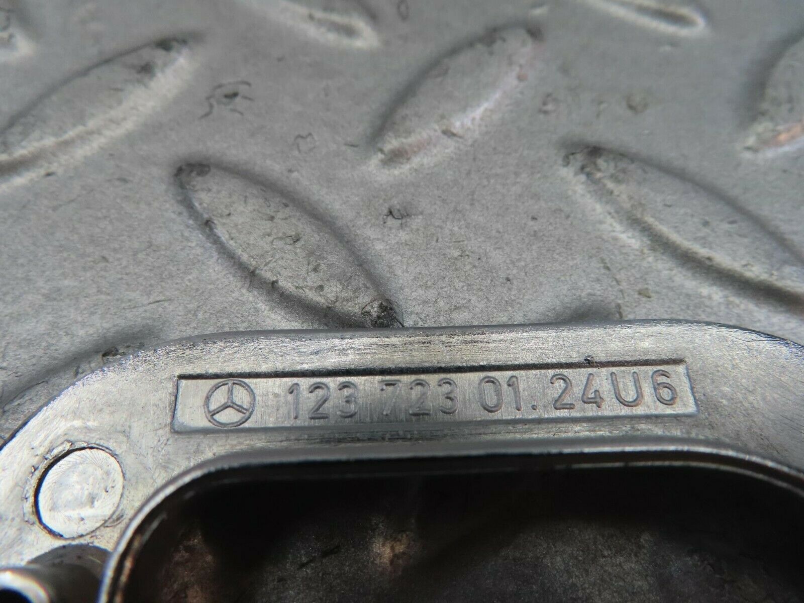 8723 Mercedes-Benz W123 Left Interior Chrome Door Latch Trim 1237230124