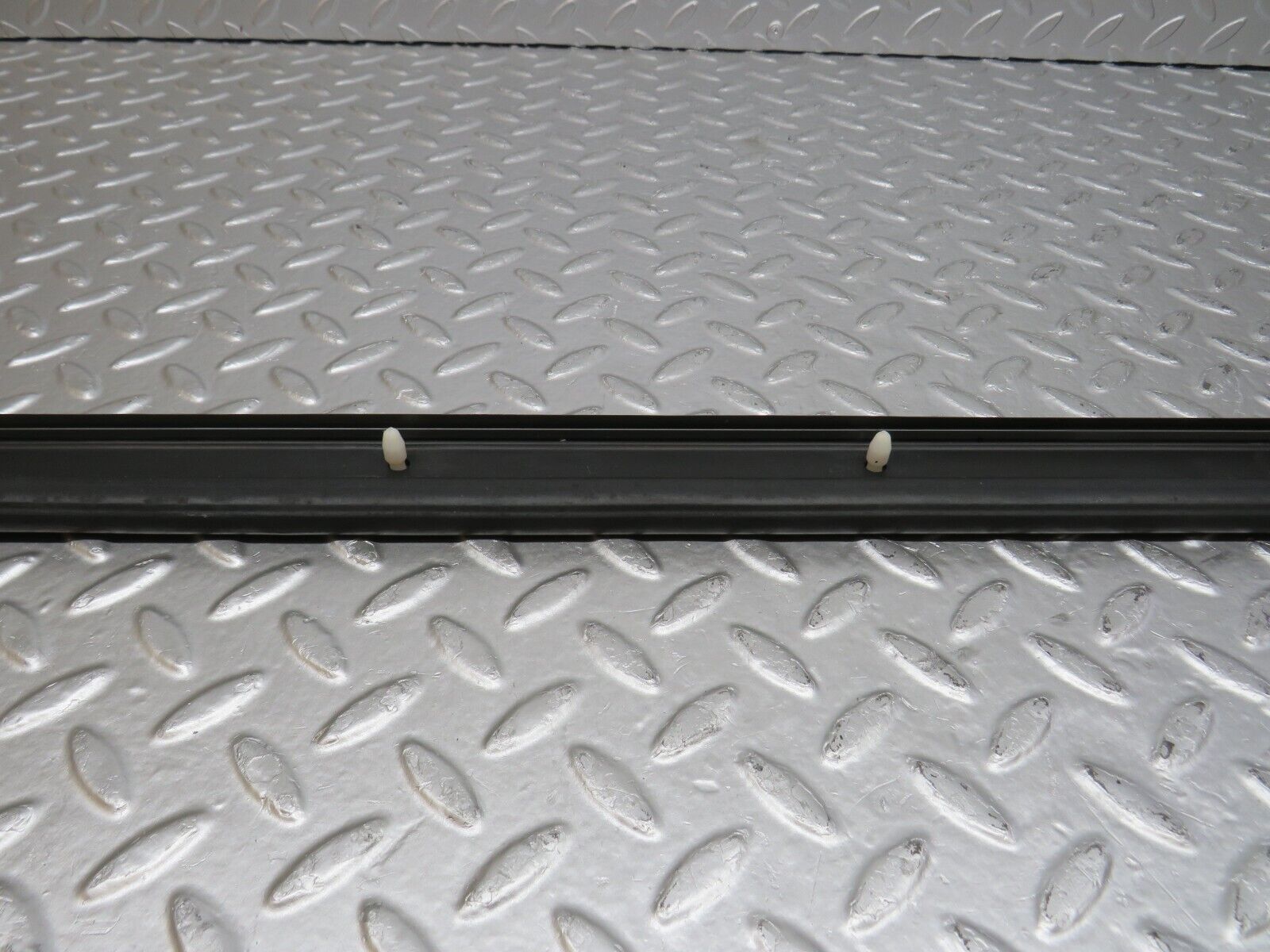 34220 Mercedes-Benz W124 260E Door Lower Sealing Rubber Trim Left