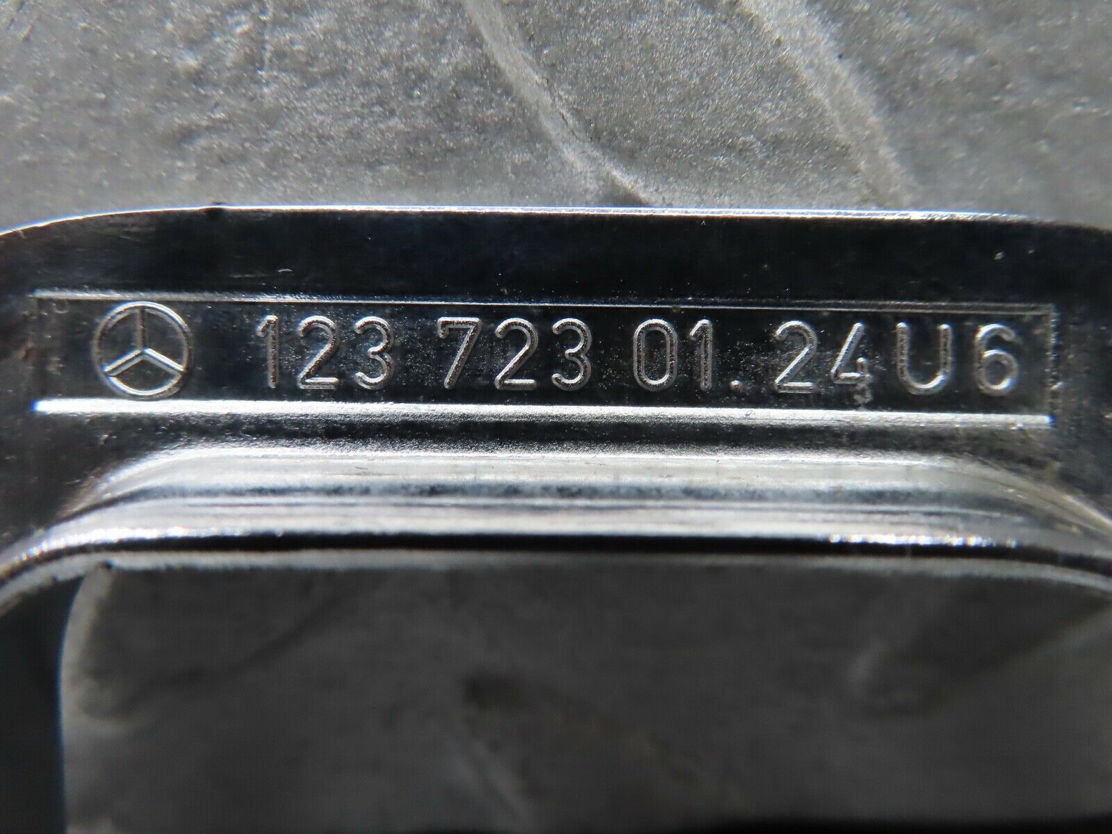 19166 Mercedes-Benz W123 300D Left Chrome Door Latch Trim 1237230124