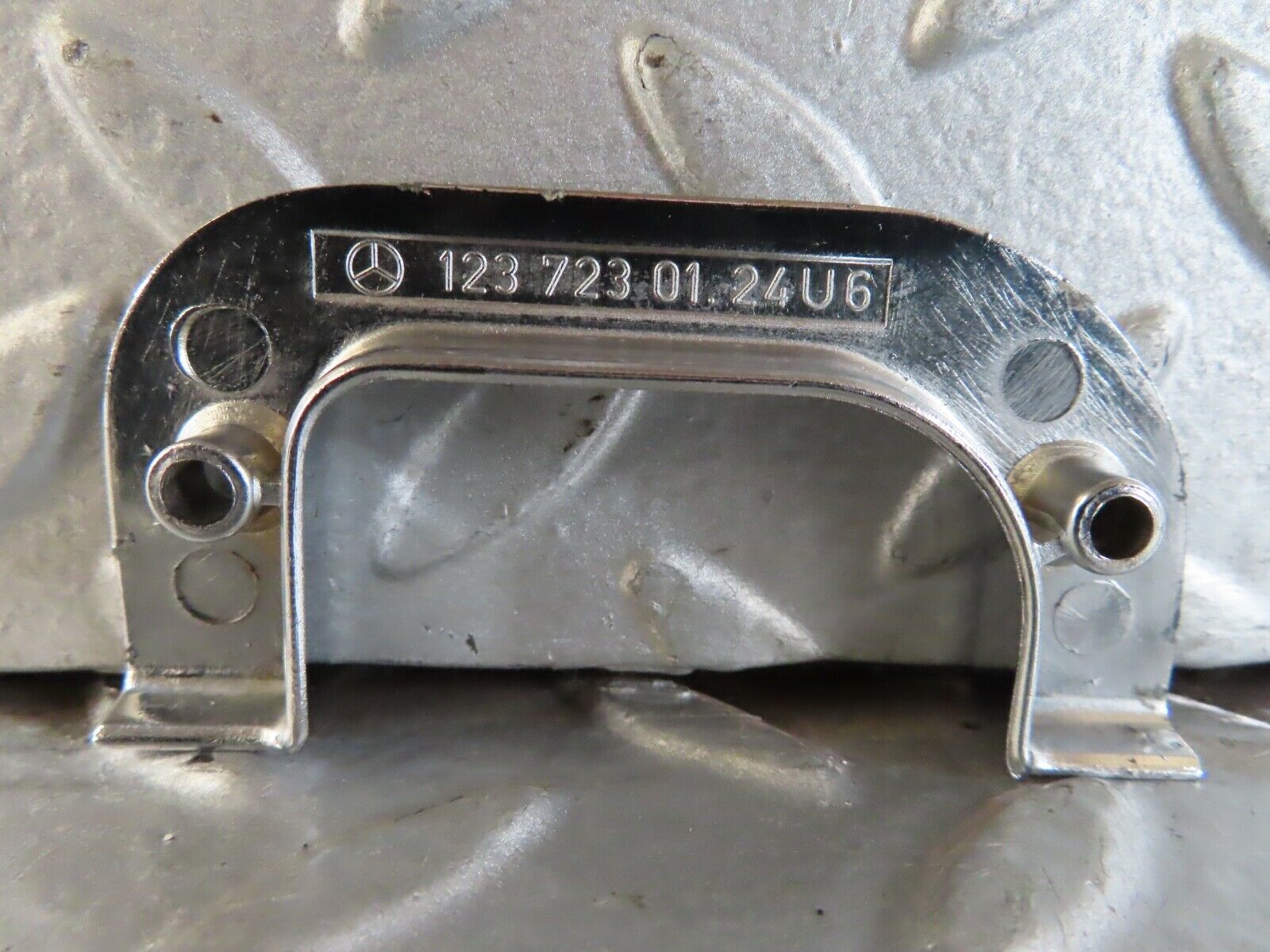 19165 Mercedes-Benz W123 300D Left Chrome Door Latch Trim 1237230124