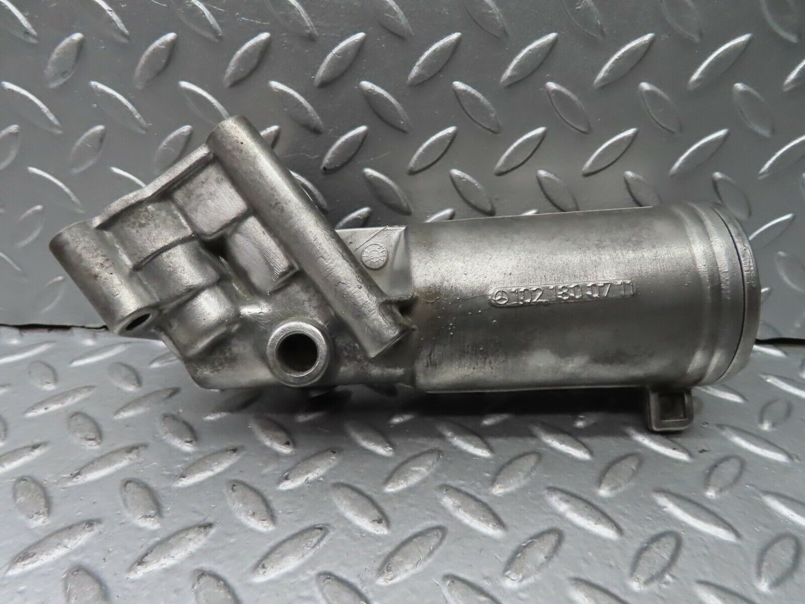 21357 Mercedes-Benz W123 230E Oil Filter Housing 1021800711