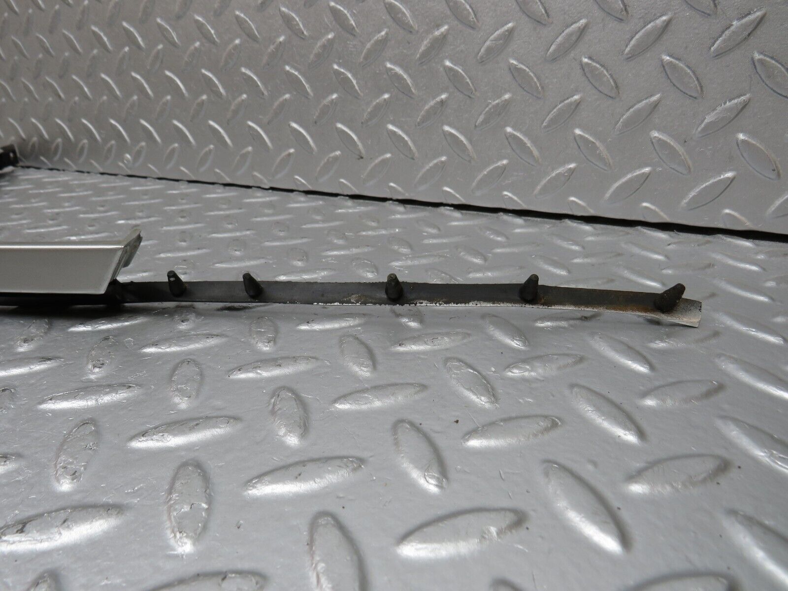 39695 Mercedes-Benz R129 320SL Coupe Left Headlight Lower Trim 1298260577 1298260777