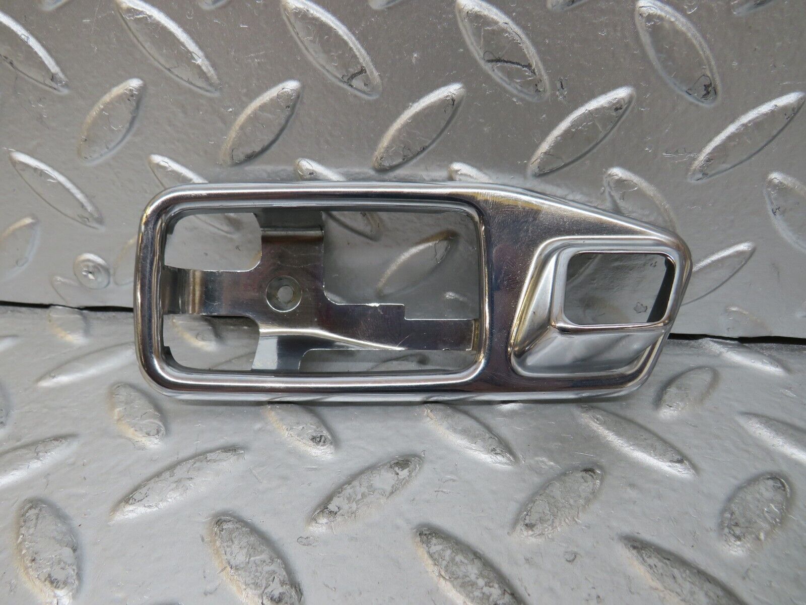 26794 Mercedes-Benz W123 240D Chrome Frame For Door Opener Left 1167660111