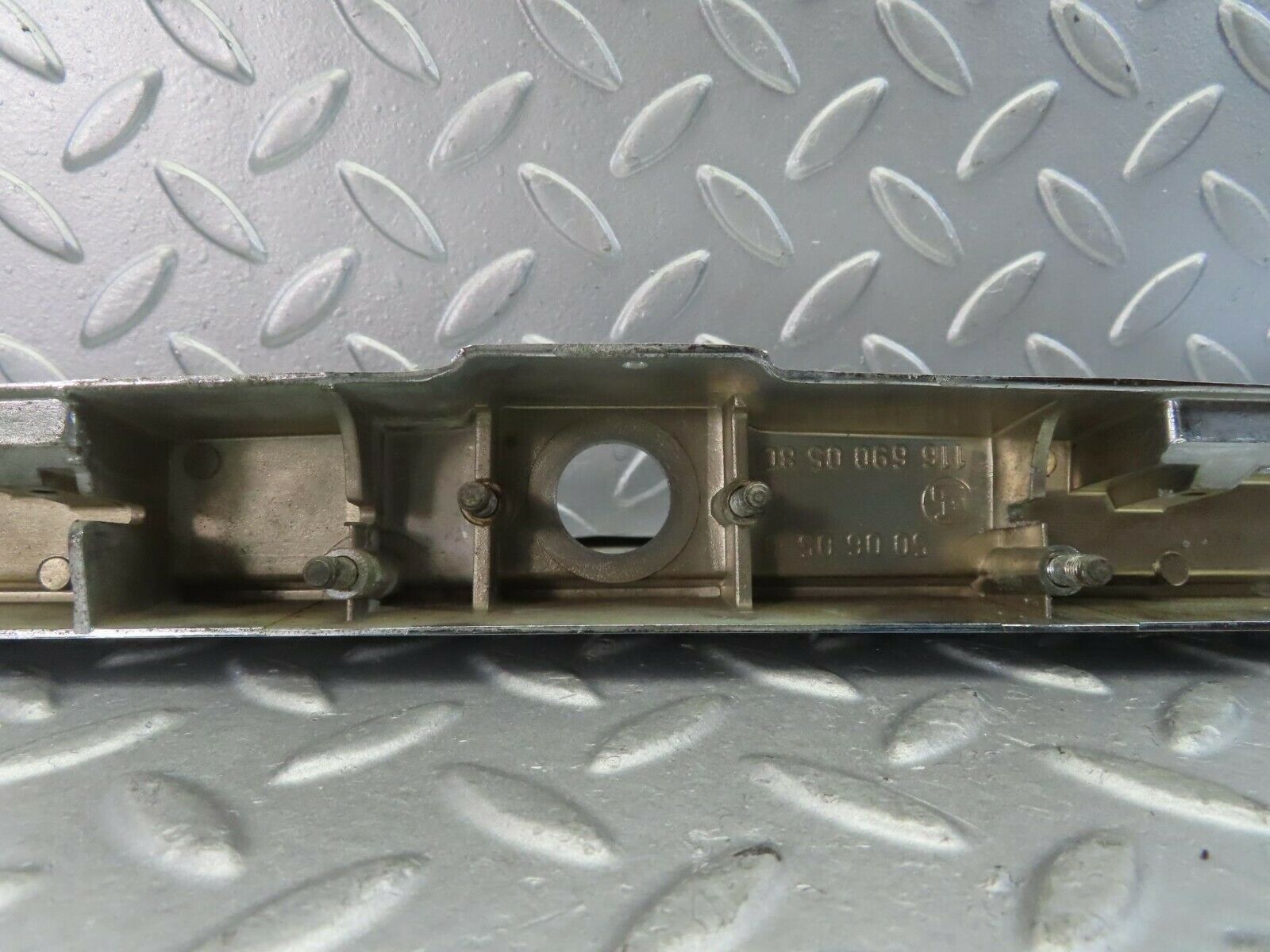 10299 Mercedes-Benz W116 number Plate Light Holder Chrome Moulding 1166900580