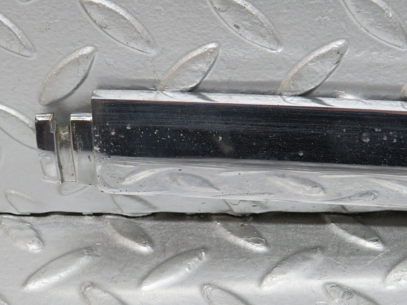 0664 Mercedes-Benz C107 350SLC Coupe Trunk Chrome Handle Moulding Left 1076901380