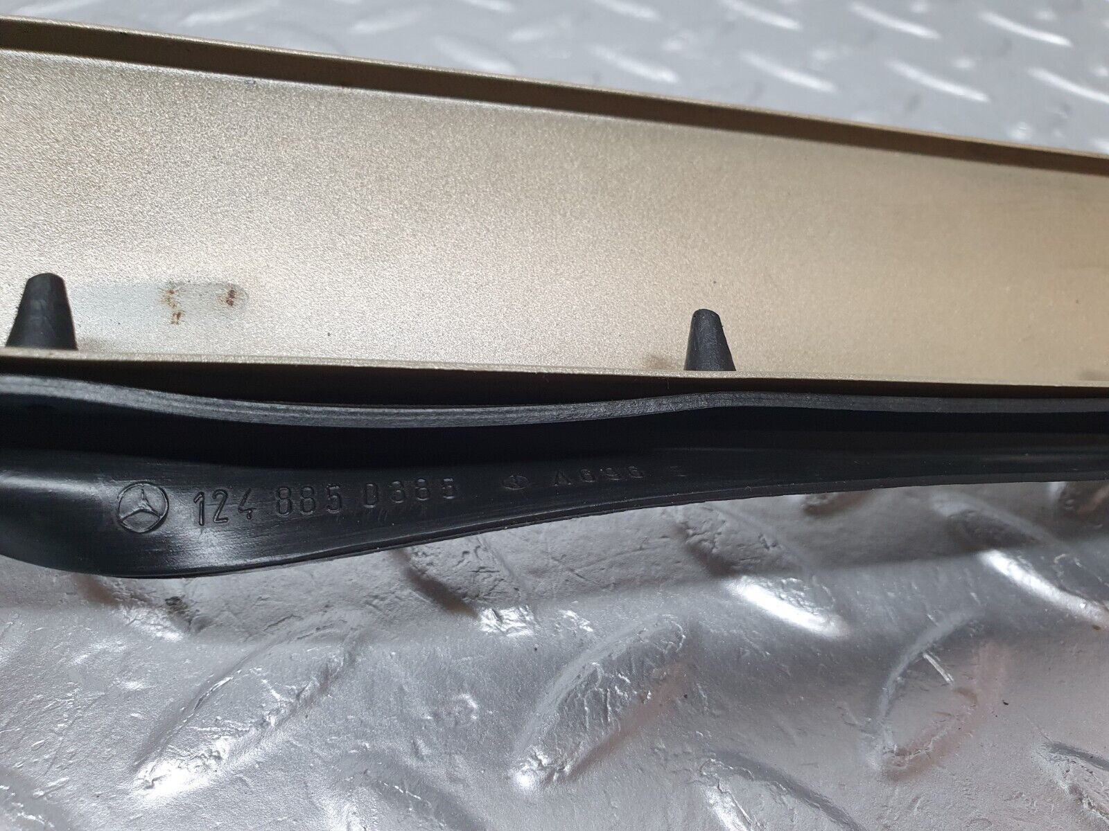 41487 Mercedes-Benz W124 200E Under Headlight Trim Left Side 1248850385