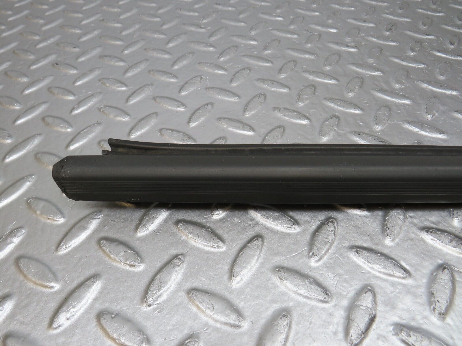 34220 Mercedes-Benz W124 260E Door Lower Sealing Rubber Trim Left