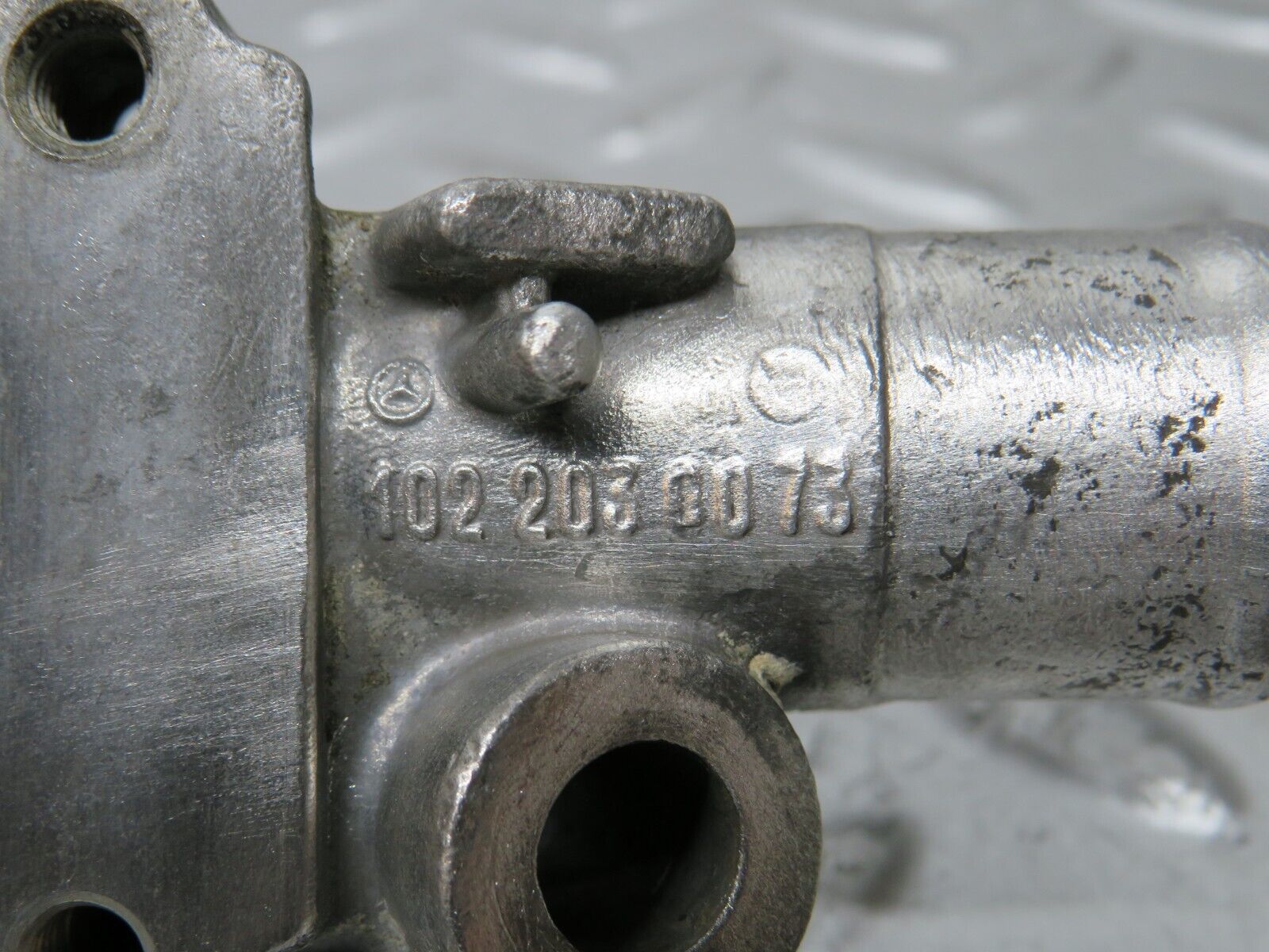 29890 Mercedes-Benz W123 230E Cooling Water Pump Housing Flange 1022030073