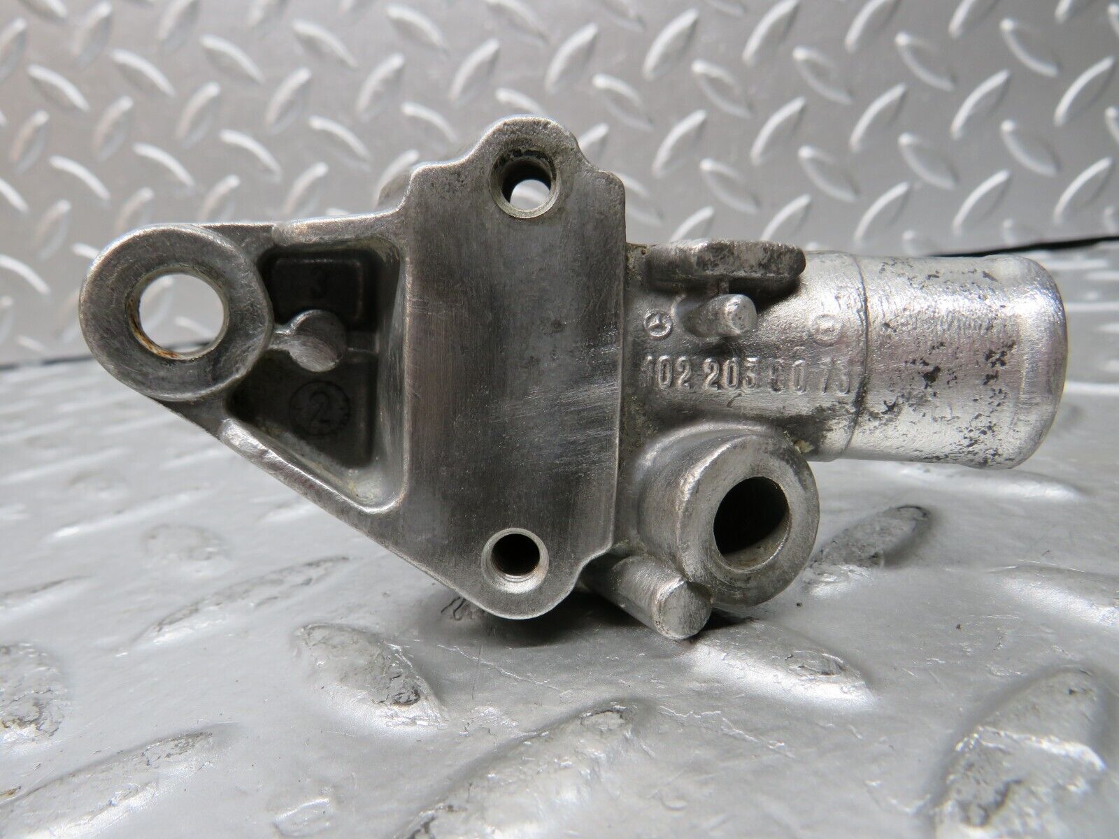 29890 Mercedes-Benz W123 230E Cooling Water Pump Housing Flange 1022030073