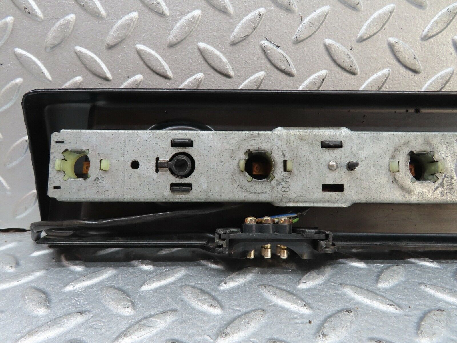 19075 Mercedes-Benz W123 300D Tail Light Bulb Holder Left Side