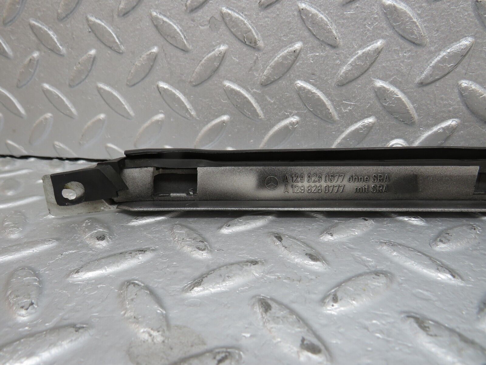 39695 Mercedes-Benz R129 320SL Coupe Left Headlight Lower Trim 1298260577 1298260777