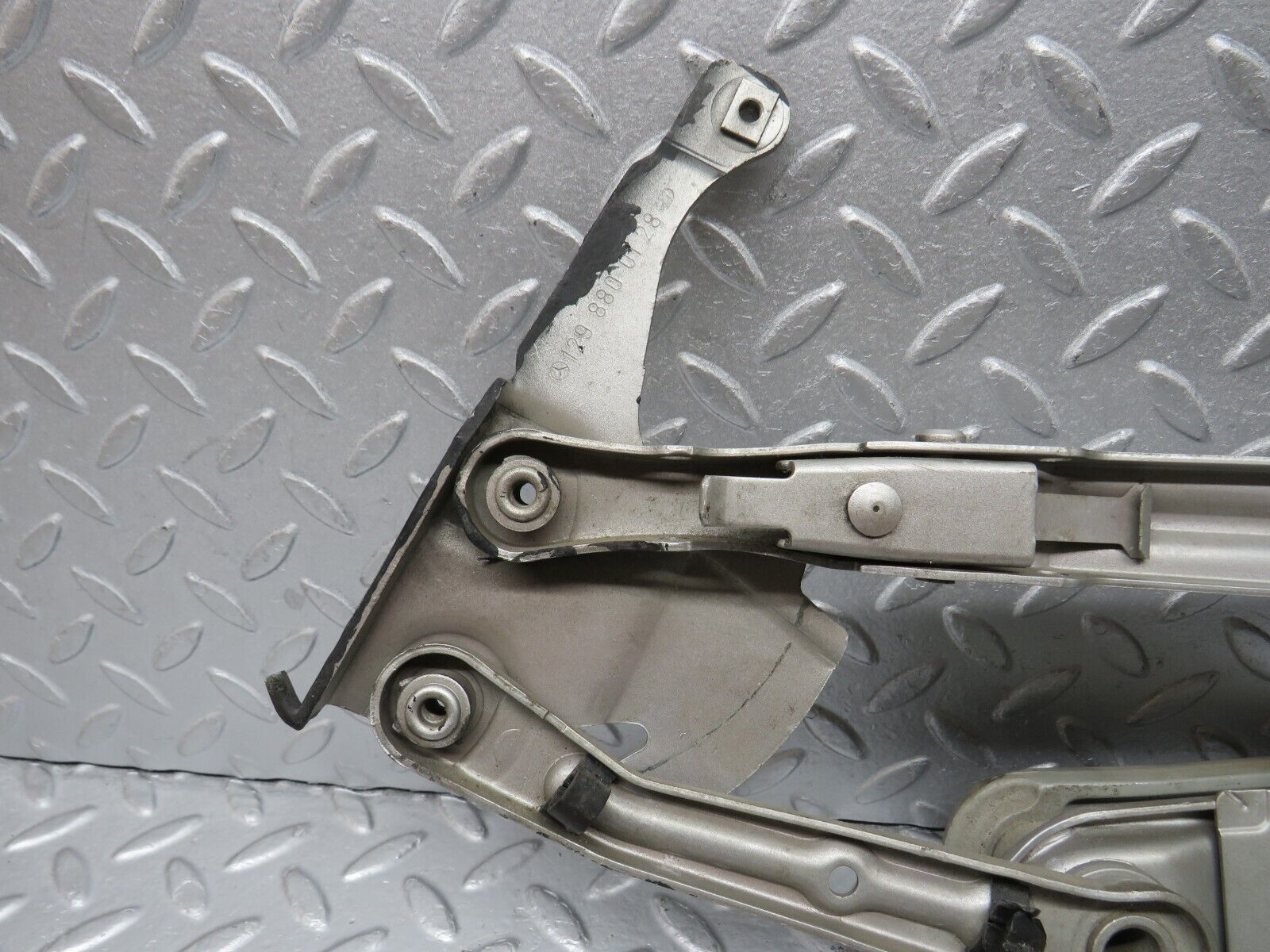 39451 Mercedes-Benz R129 320SL Coupe Bonnet Hinge Left Side 1298800128 1298870174