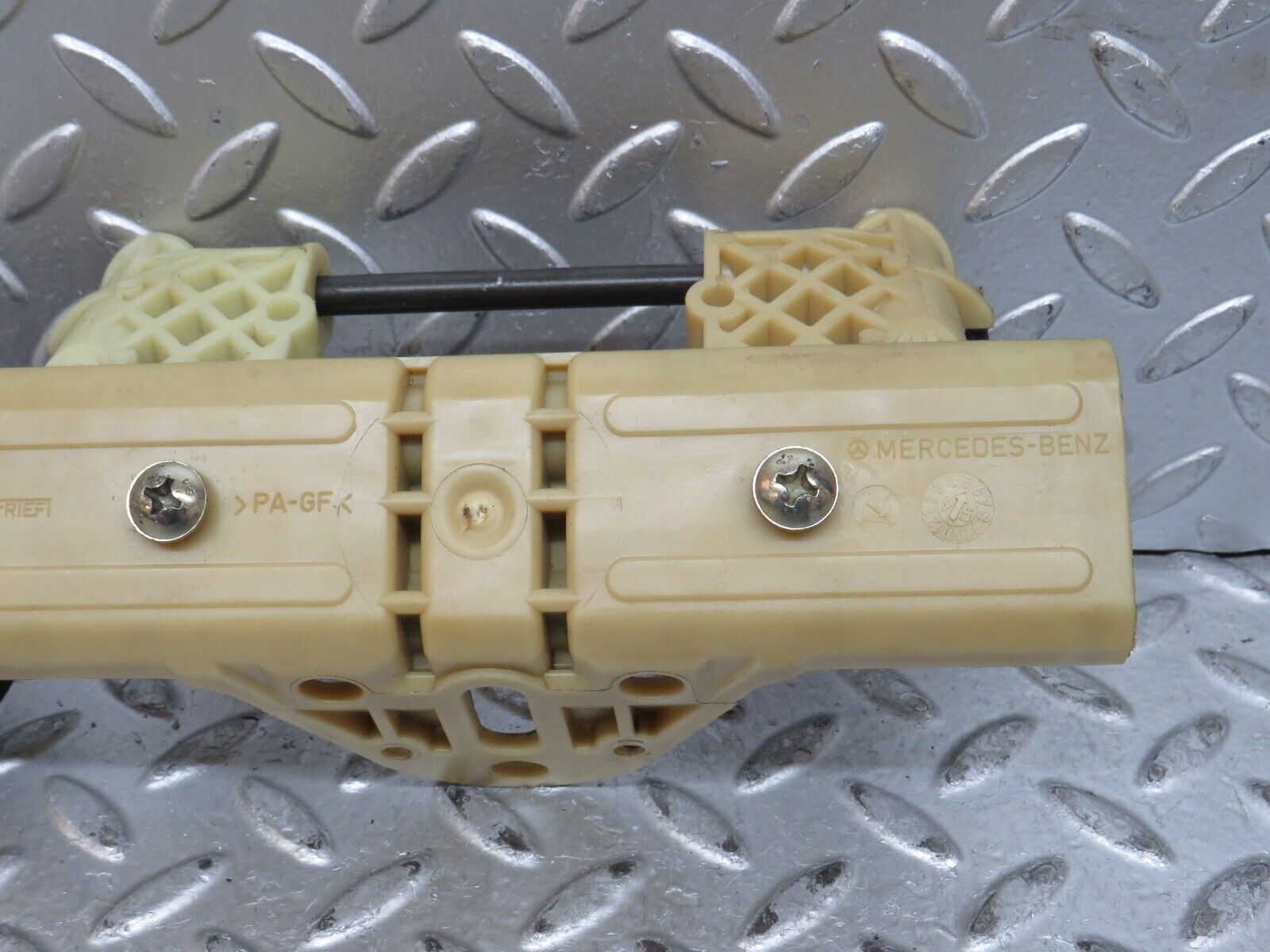 29043 Mercedes-Benz C124 320CE Rear Headrest Folding Mechanism 1248000675