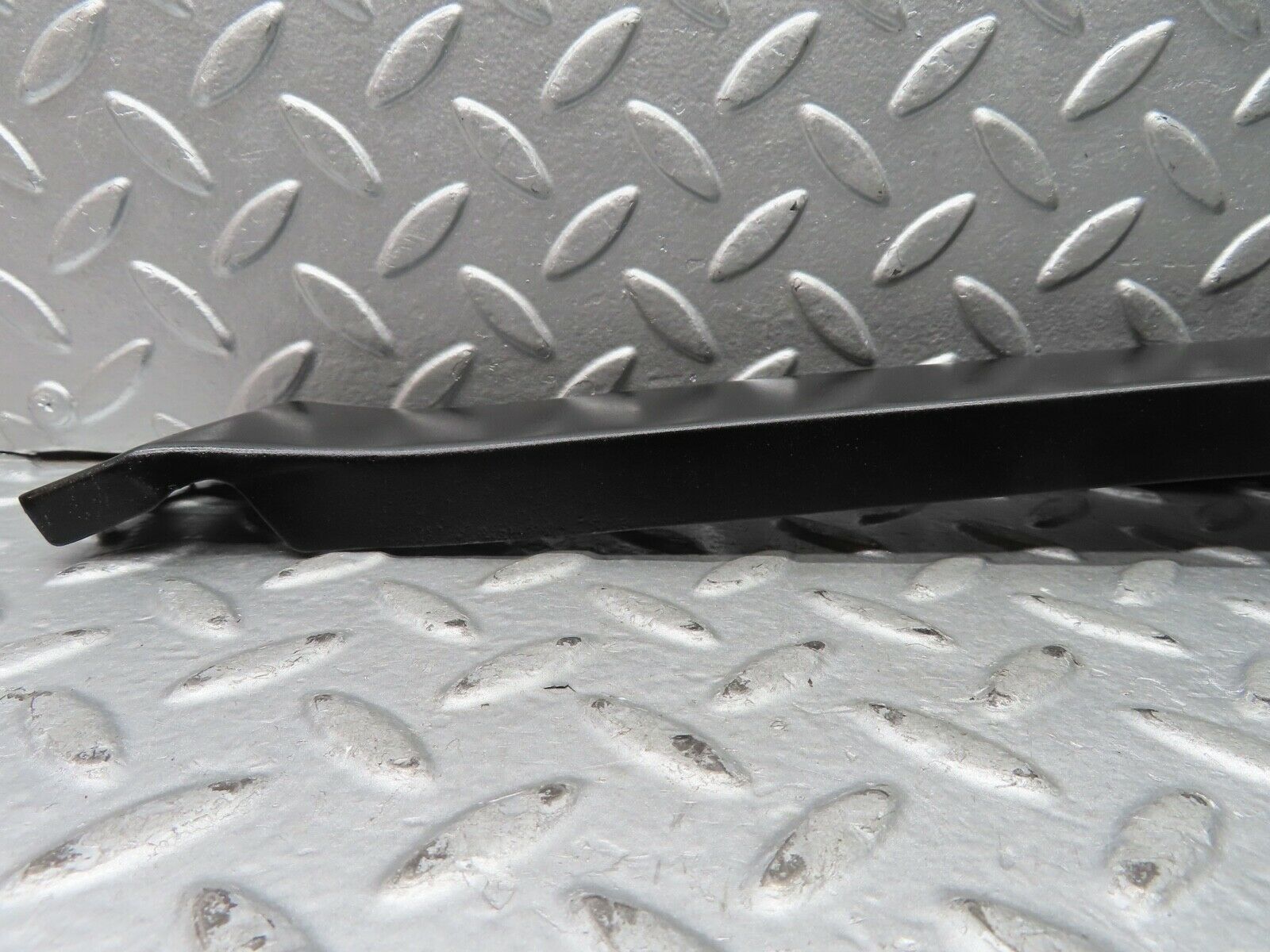 21682 Mercedes-Benz W126 300SE Left Headlight Lower Trim