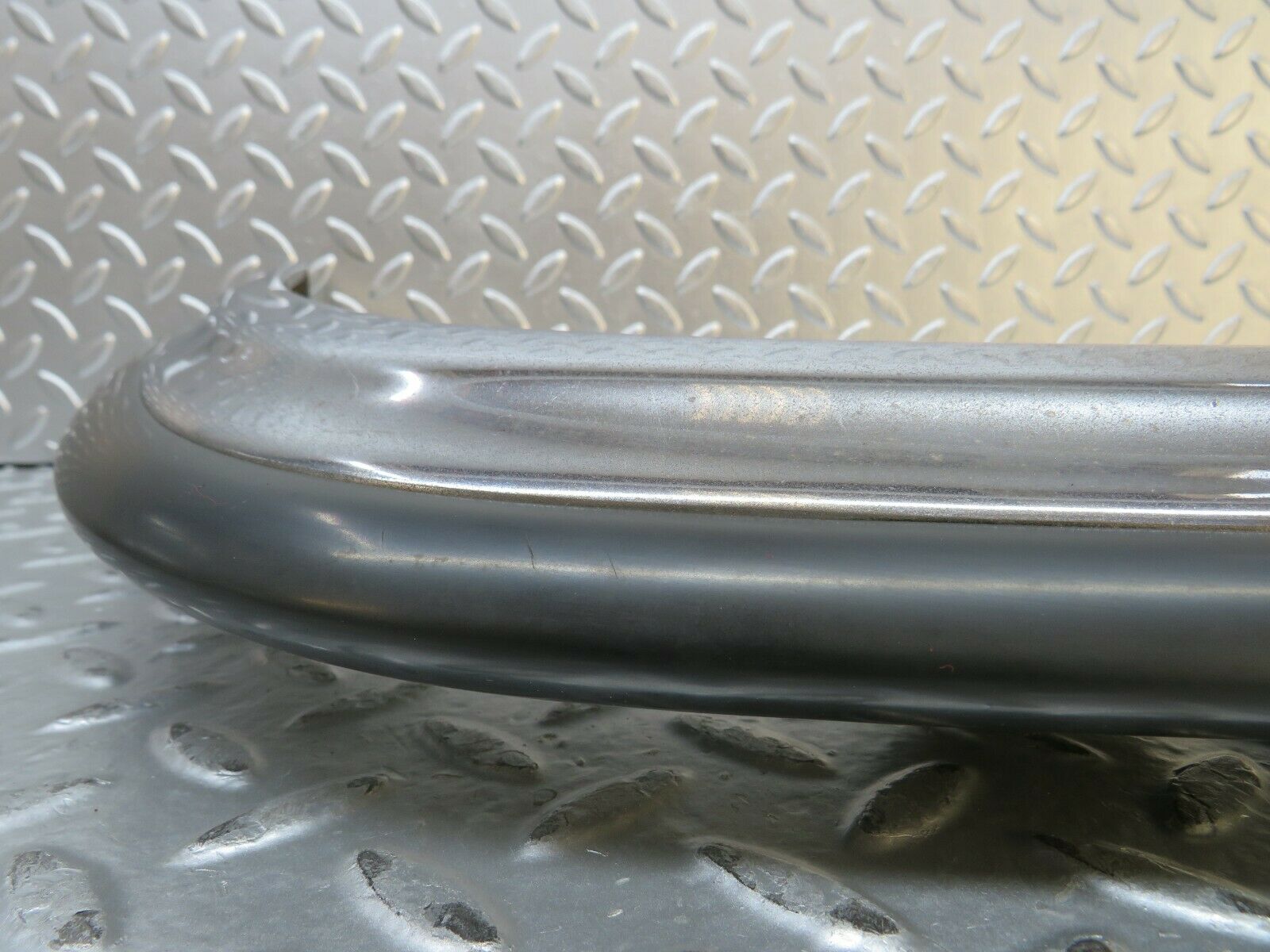 23238 Mercedes-Benz W116 350SE Front Right Upper Bumper Corner