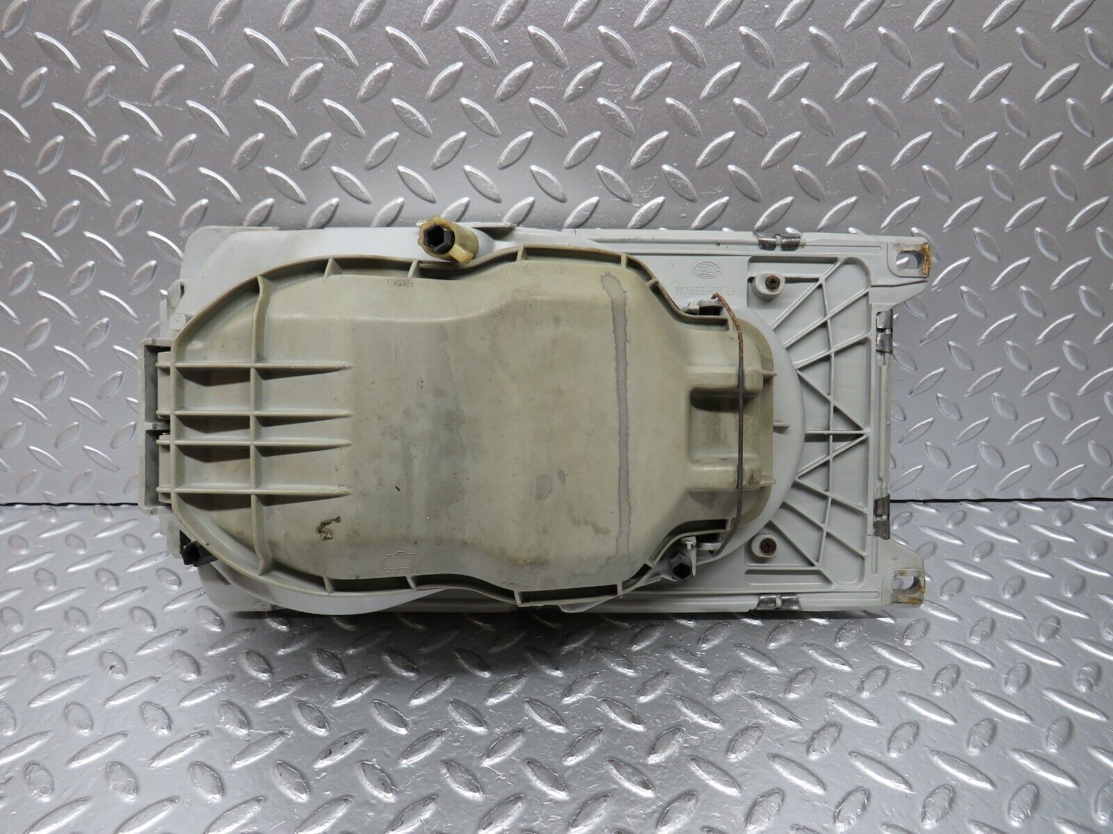 31058 Mercedes-Benz W123 200D Headlight Hella Left Side 117683-00