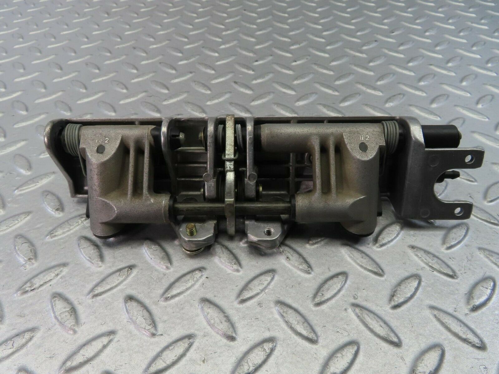 9319 Mercedes-Benz C124 300CE Coupe Headrest Folding Mechanism 1249700025