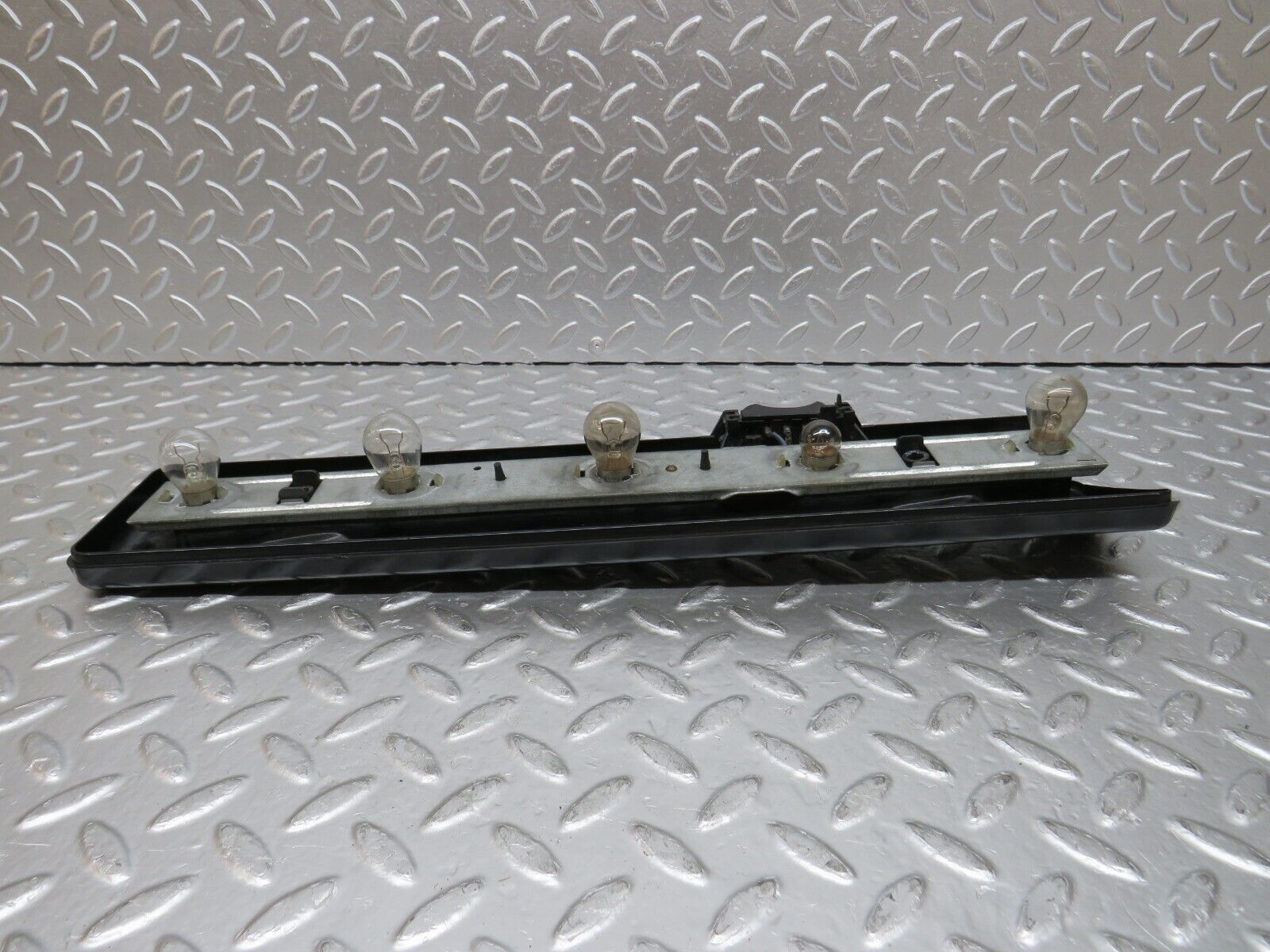 31054 Mercedes-Benz W123 200D Tail Light Bulb Holder Left Side 22064L