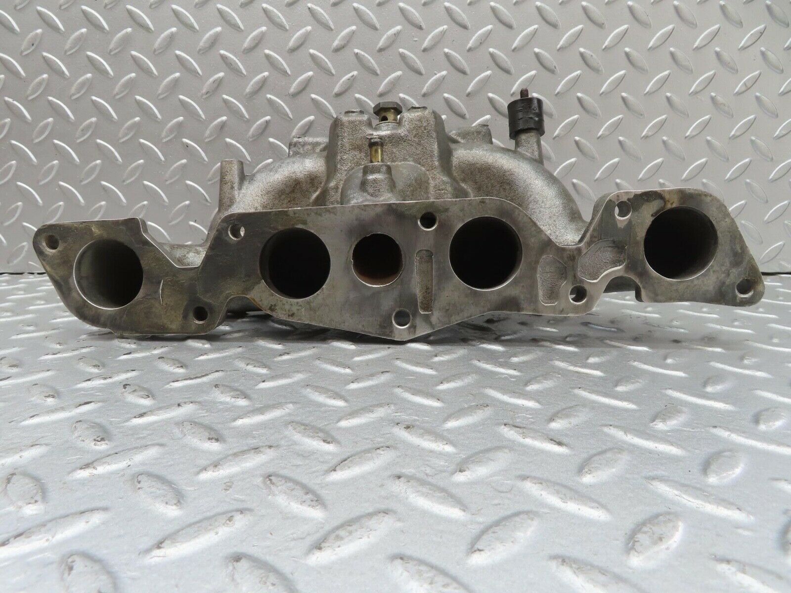 13582 Mercedes-Benz W123 200 Intake Manifold 1021411701