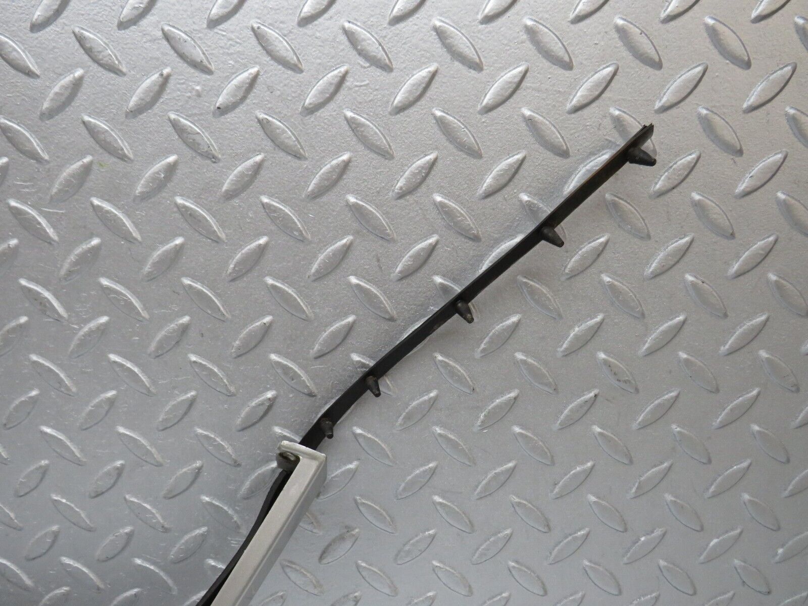 39695 Mercedes-Benz R129 320SL Coupe Left Headlight Lower Trim 1298260577 1298260777