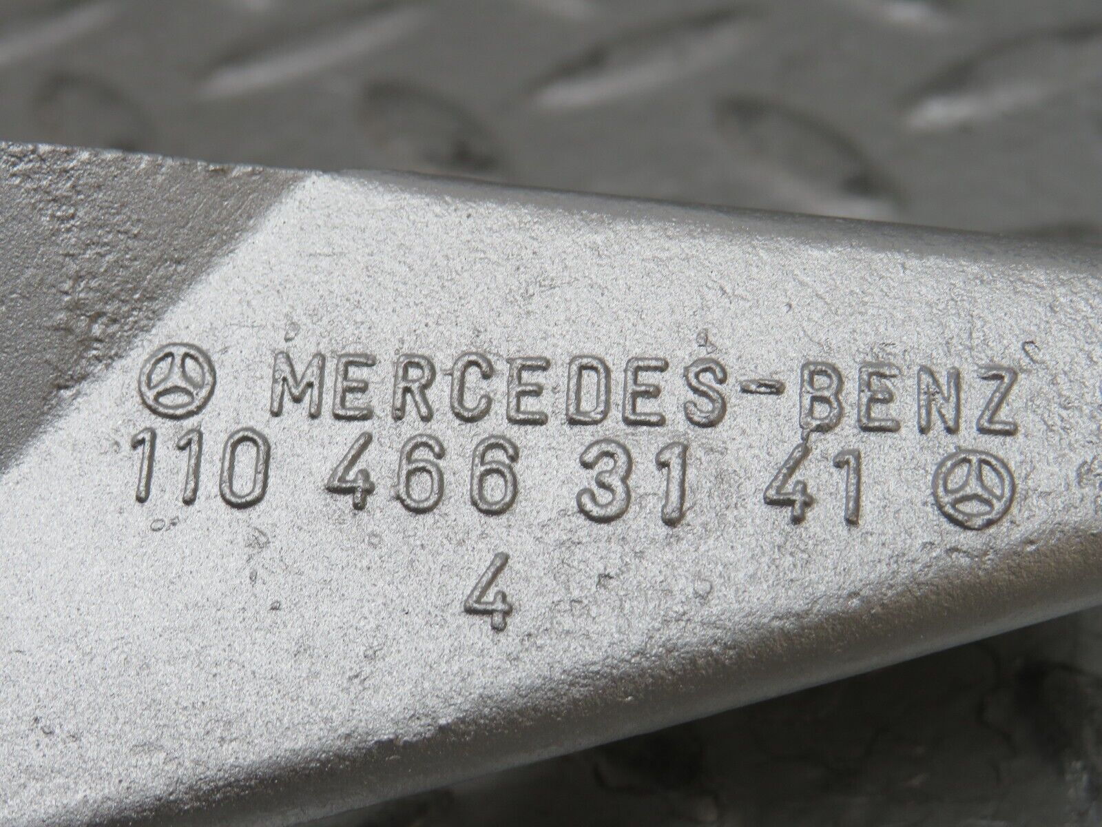 27932 Mercedes-Benz W123 280E Power Steering Pump Bracket 1104663141