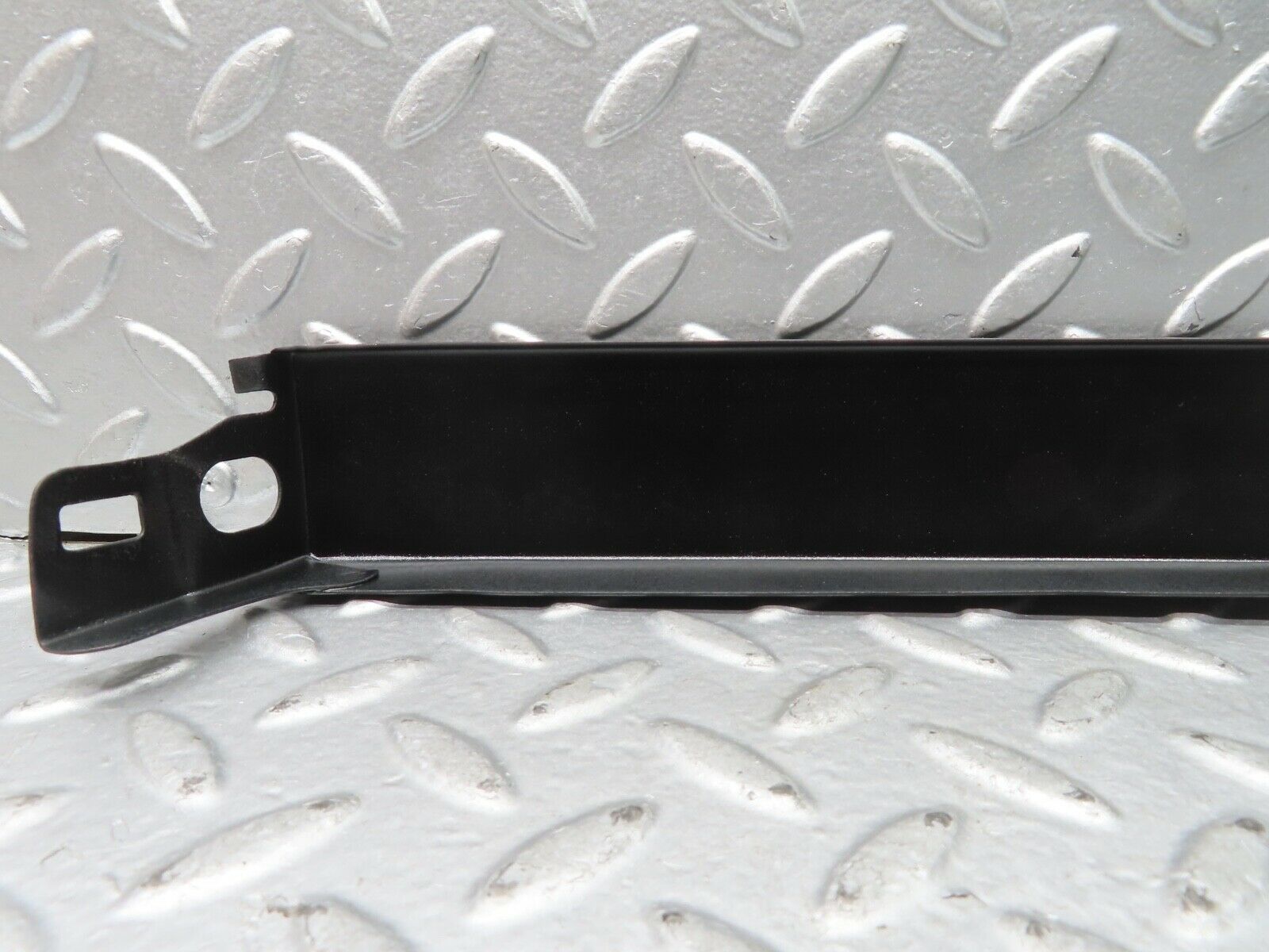 21682 Mercedes-Benz W126 300SE Left Headlight Lower Trim