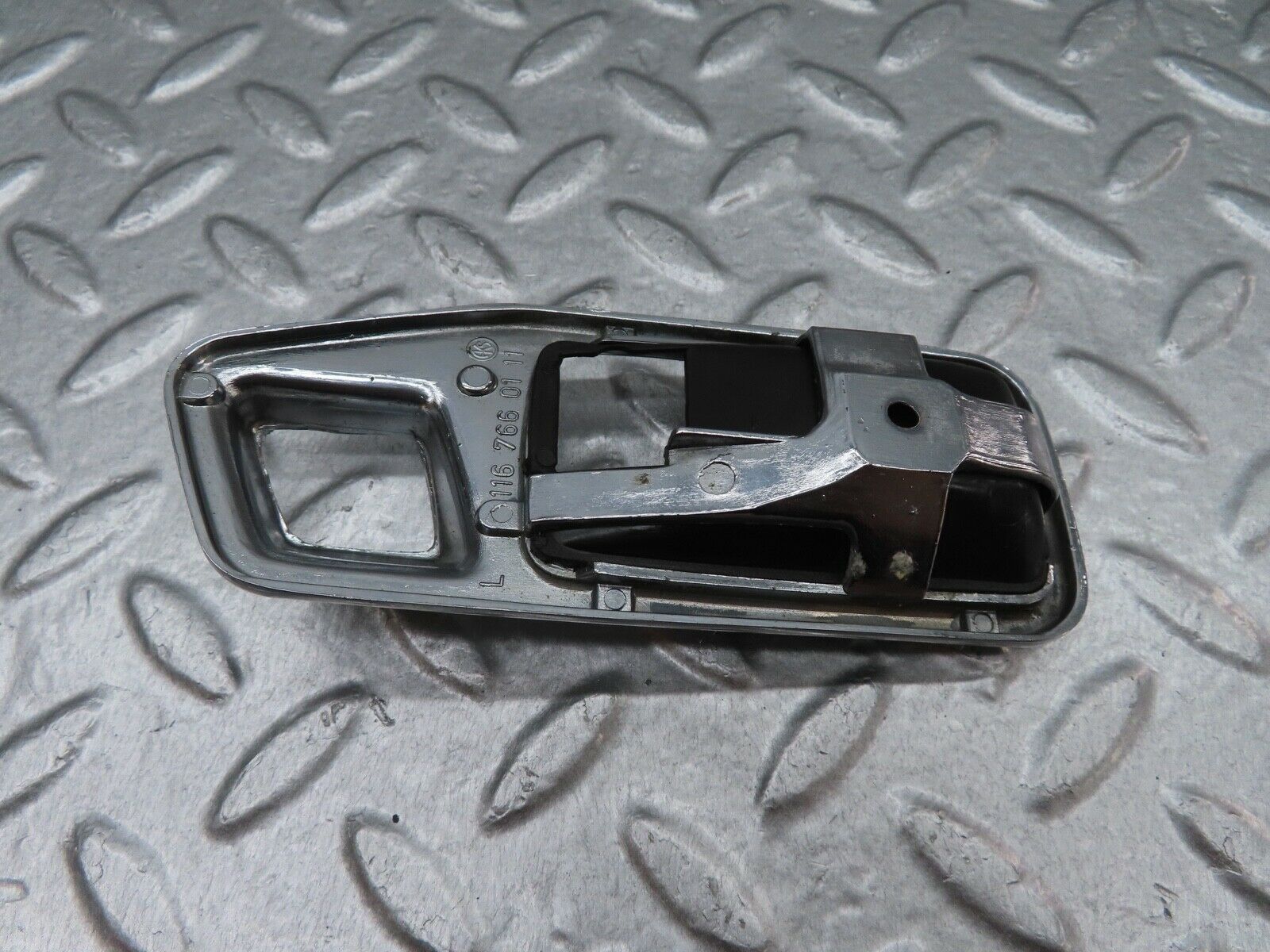 17958 Mercedes-Benz W123 200 Chrome Frame For Door Opener Left 1167660111