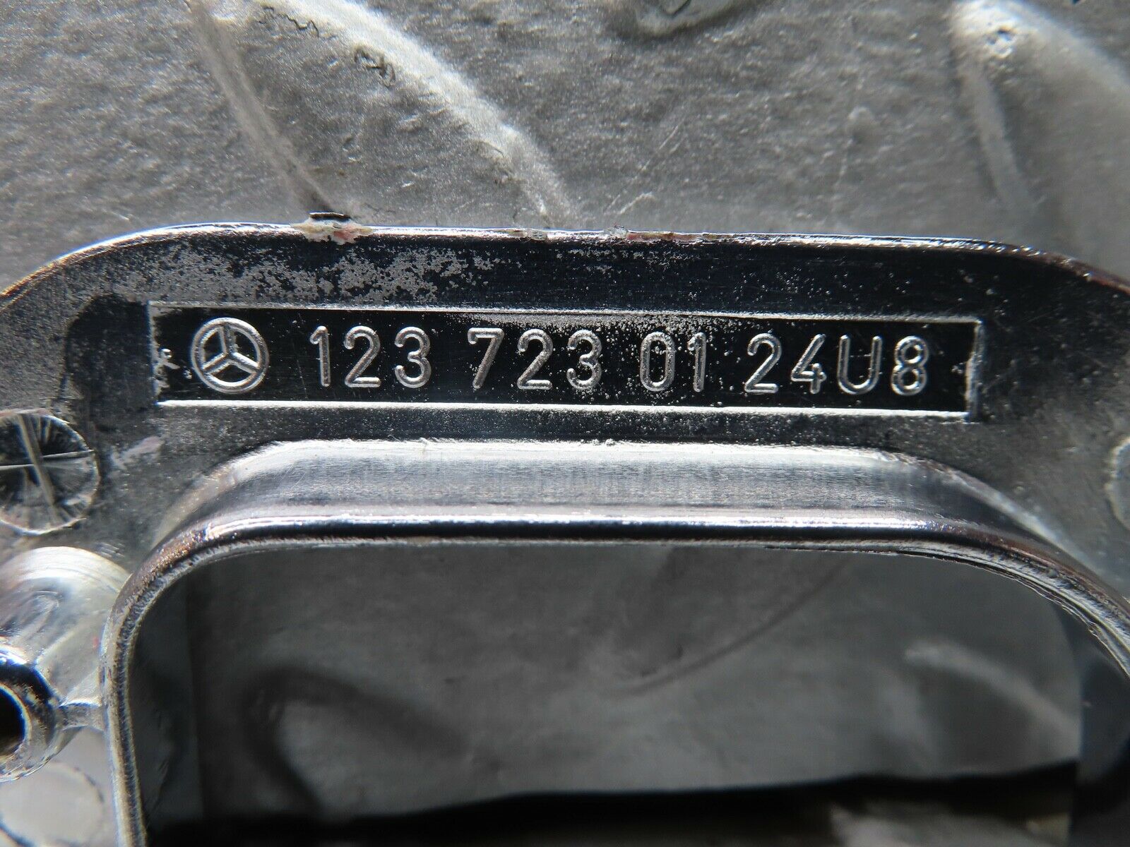 21492 Mercedes-Benz W126 300SE Left Chrome Door Latch Trim 1237230124