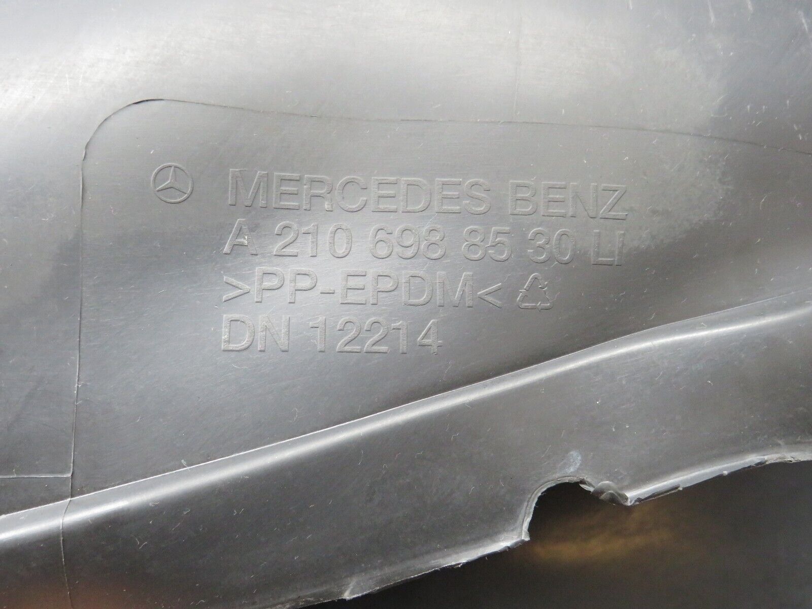 34788 Mercedes-Benz W210 320E Front Left Inner Fender Wing Splash Guard 2106988530