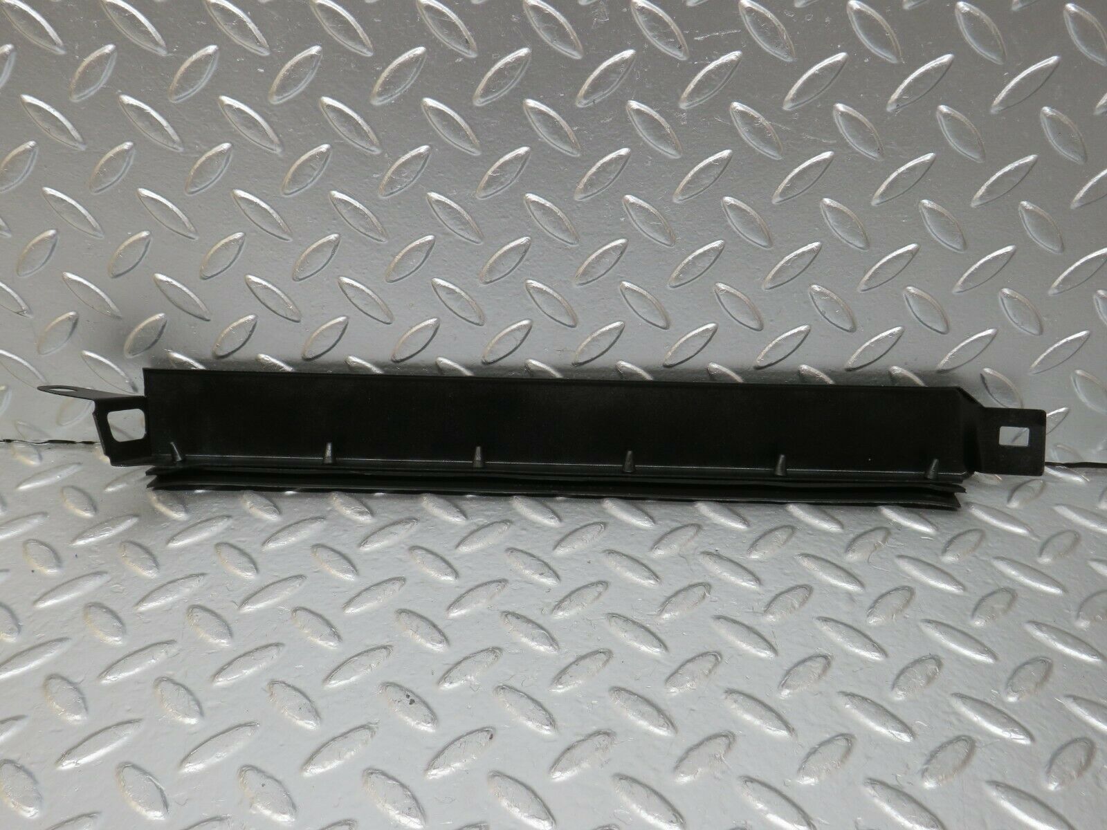 24402 Mercedes-Benz S124 220TE Wagon Under Headlight Trim Left