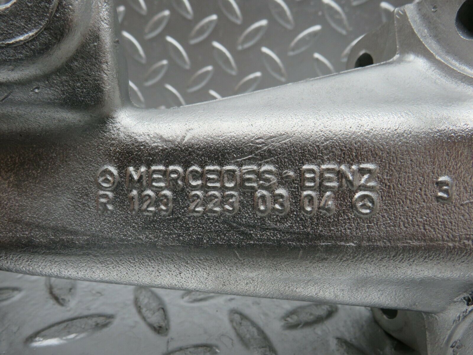 24110 Mercedes-Benz W123 280E Engine Mount Bracket 1232230304