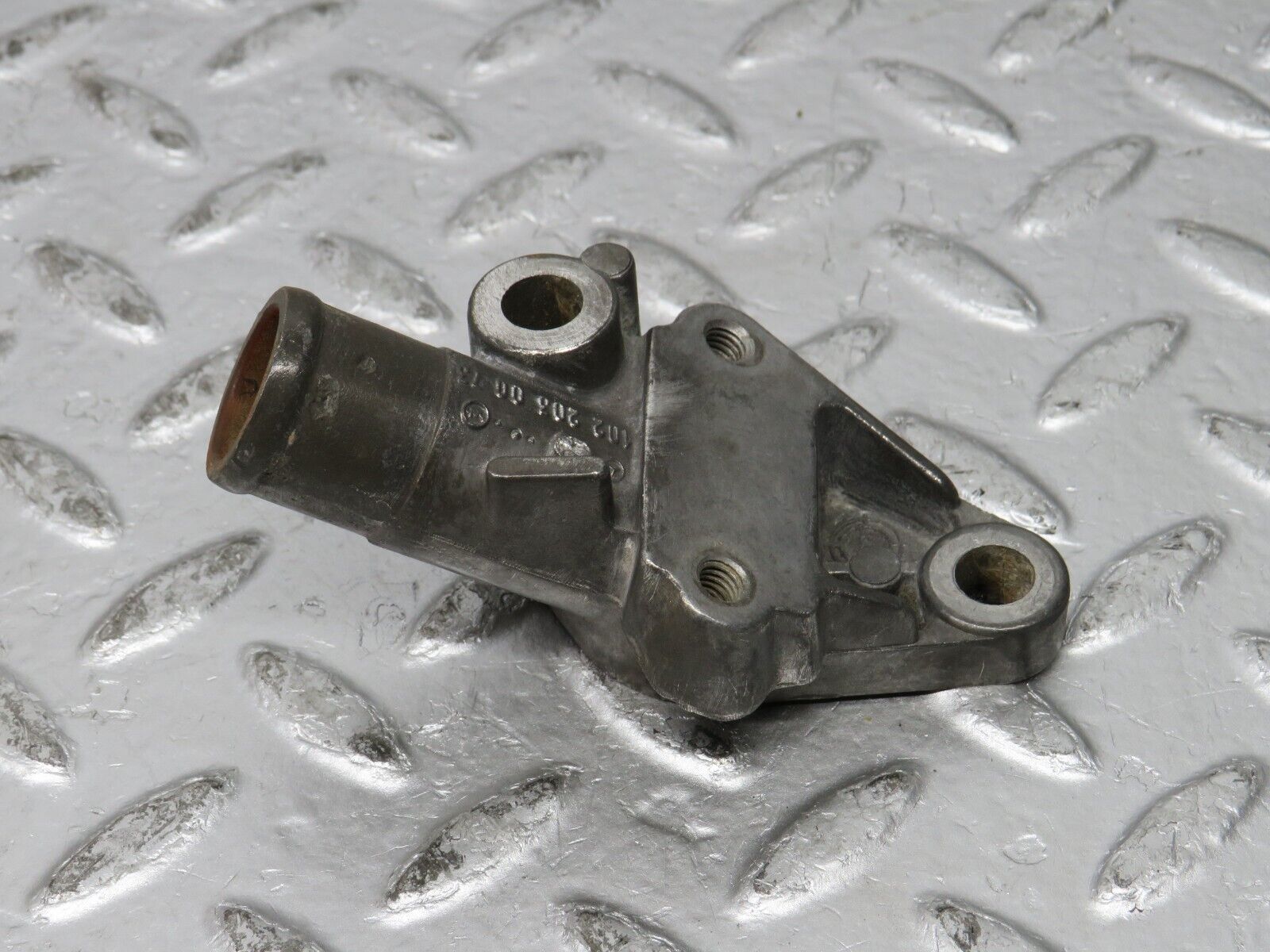 32058 Mercedes-Benz W123 230E Cooling Water Pump Housing Flange 1022030073