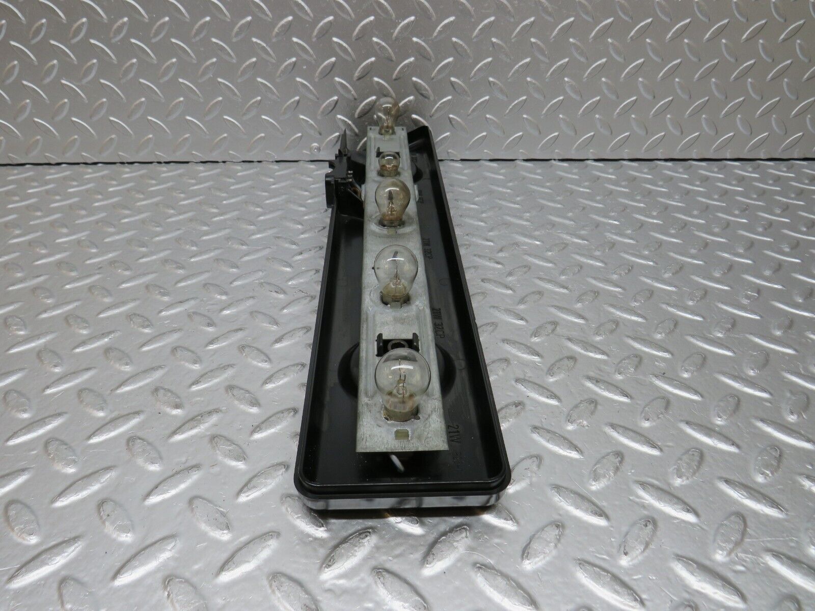 31054 Mercedes-Benz W123 200D Tail Light Bulb Holder Left Side 22064L