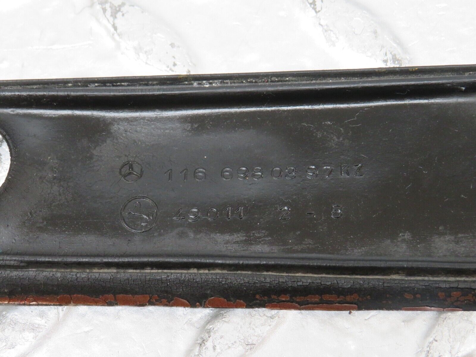 26038 Mercedes-Benz W116 450SE number Plate Light Holder Moulding 1166900580