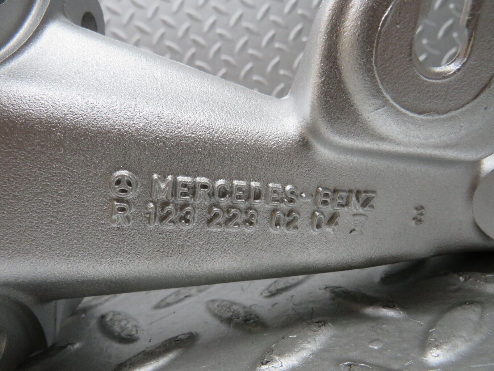 27323 Mercedes-Benz W123 280E Engine Mount Bracket Left Side 1232230204