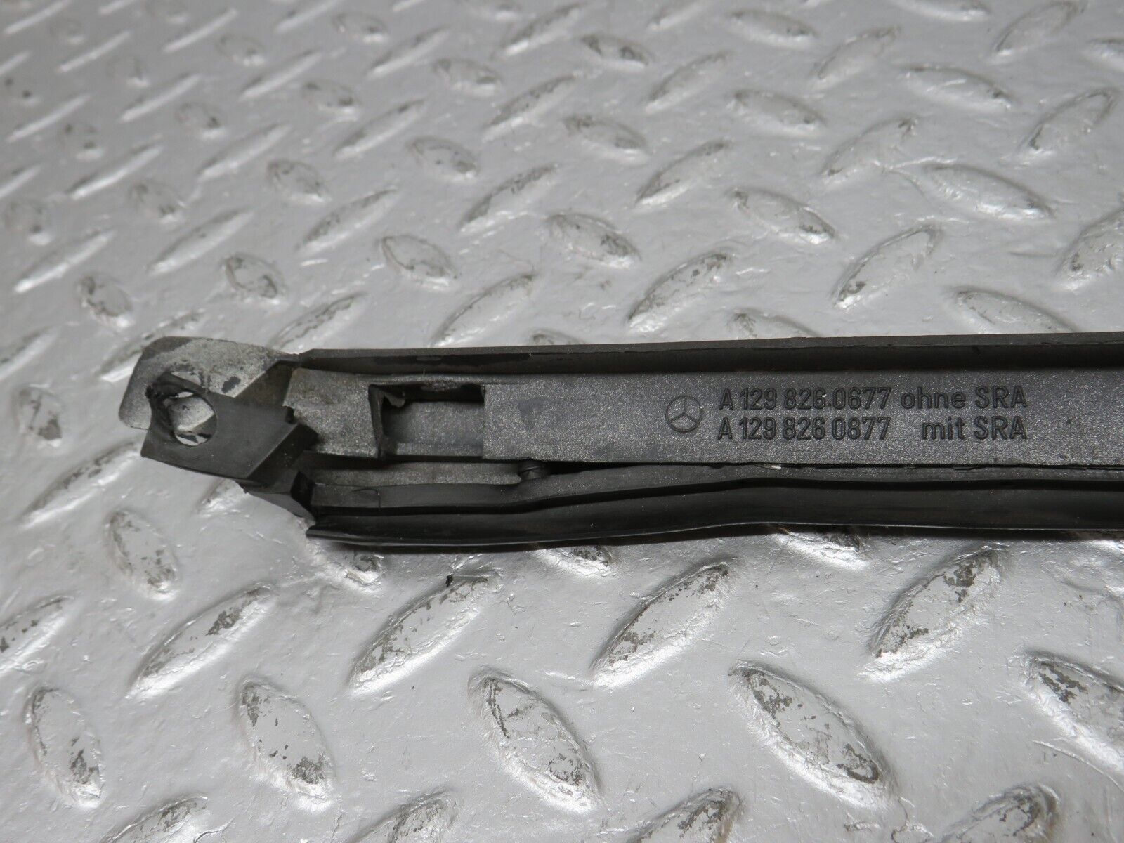 39694 Mercedes-Benz R129 320SL Coupe Right Headlight Lower Trim 1298260677 1298260877